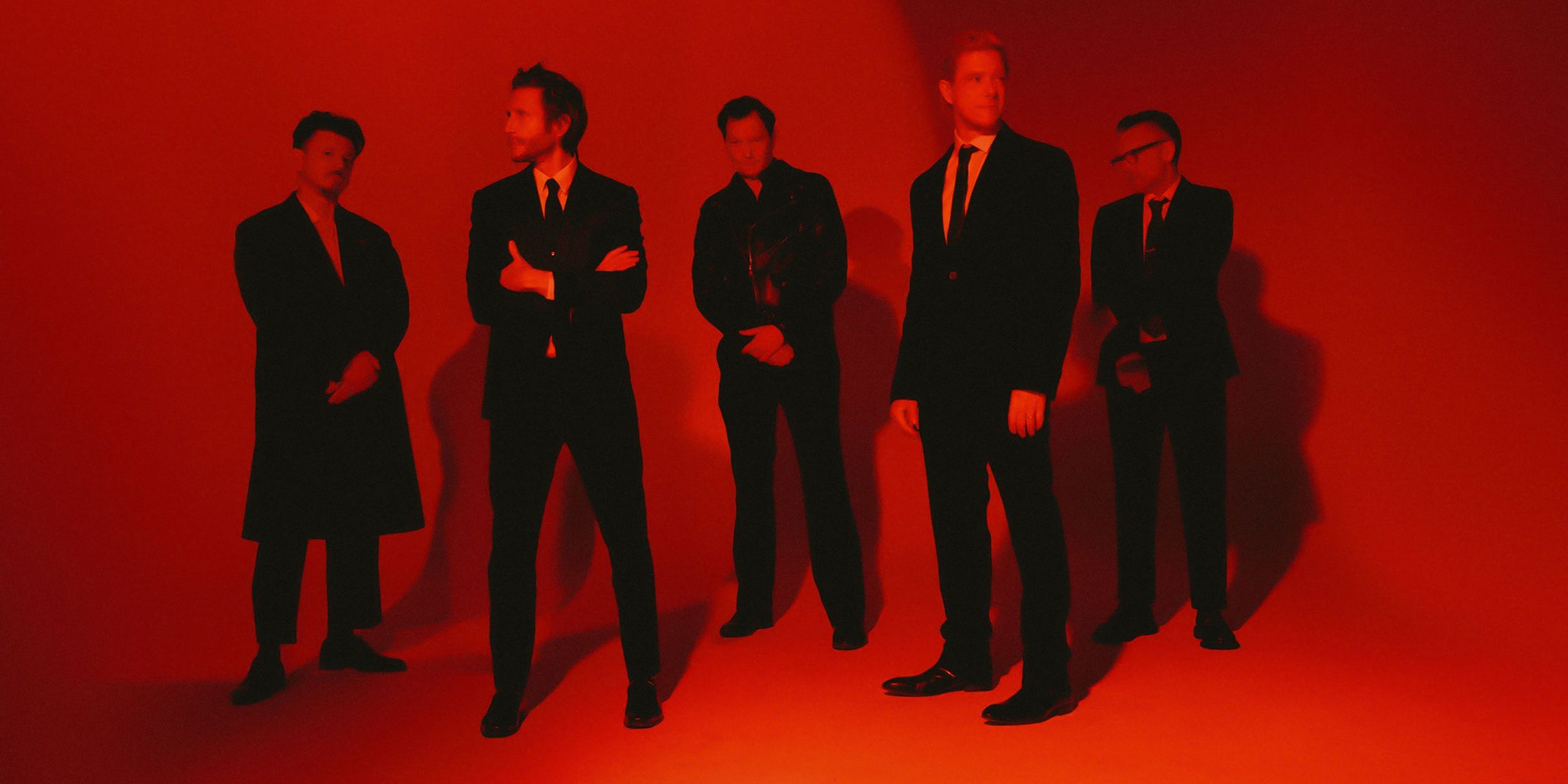 Interpol performing live on stage during their 2026 tour