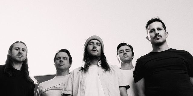 Saosin performing live on stage, post-hardcore band teasing new music in 2026