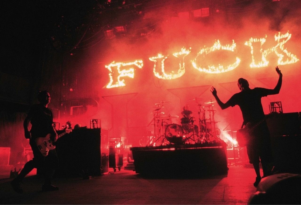 Blink-182 performing live on stage during their reunion era
