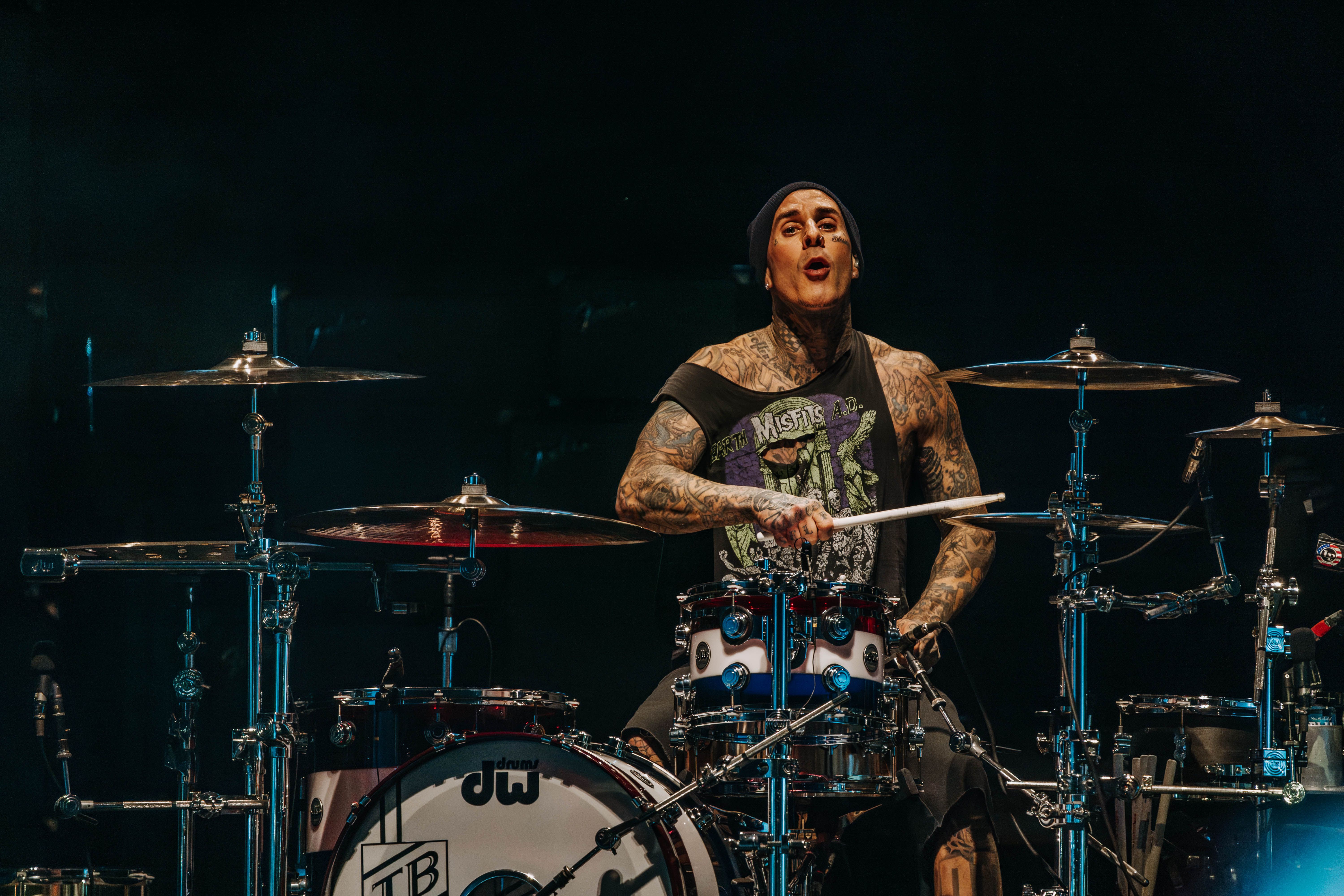 Travis Barker performing live on drums with Blink-182