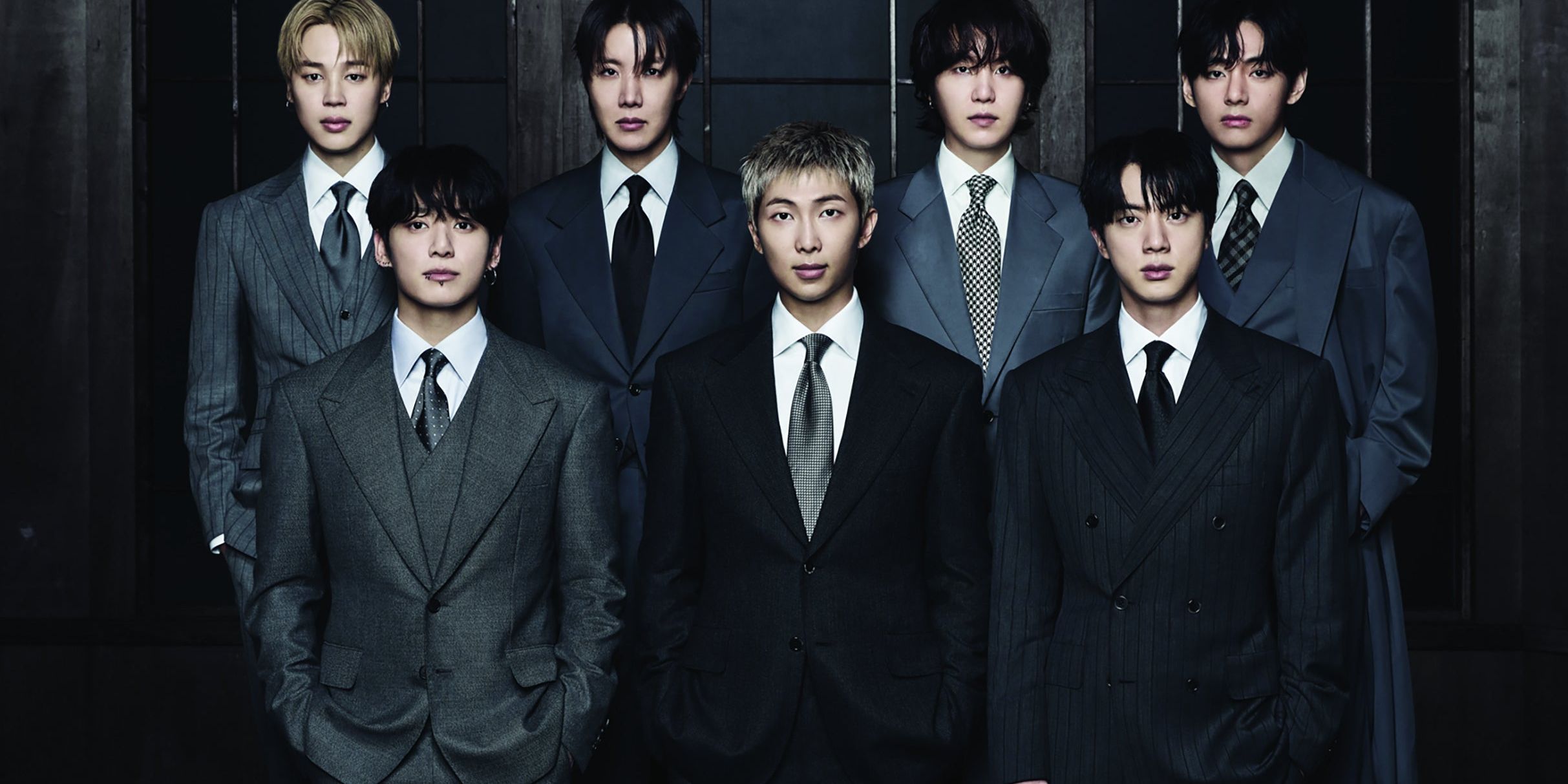 BTS performing live at Gwanghwamun Square in Seoul during their 2026 comeback concert