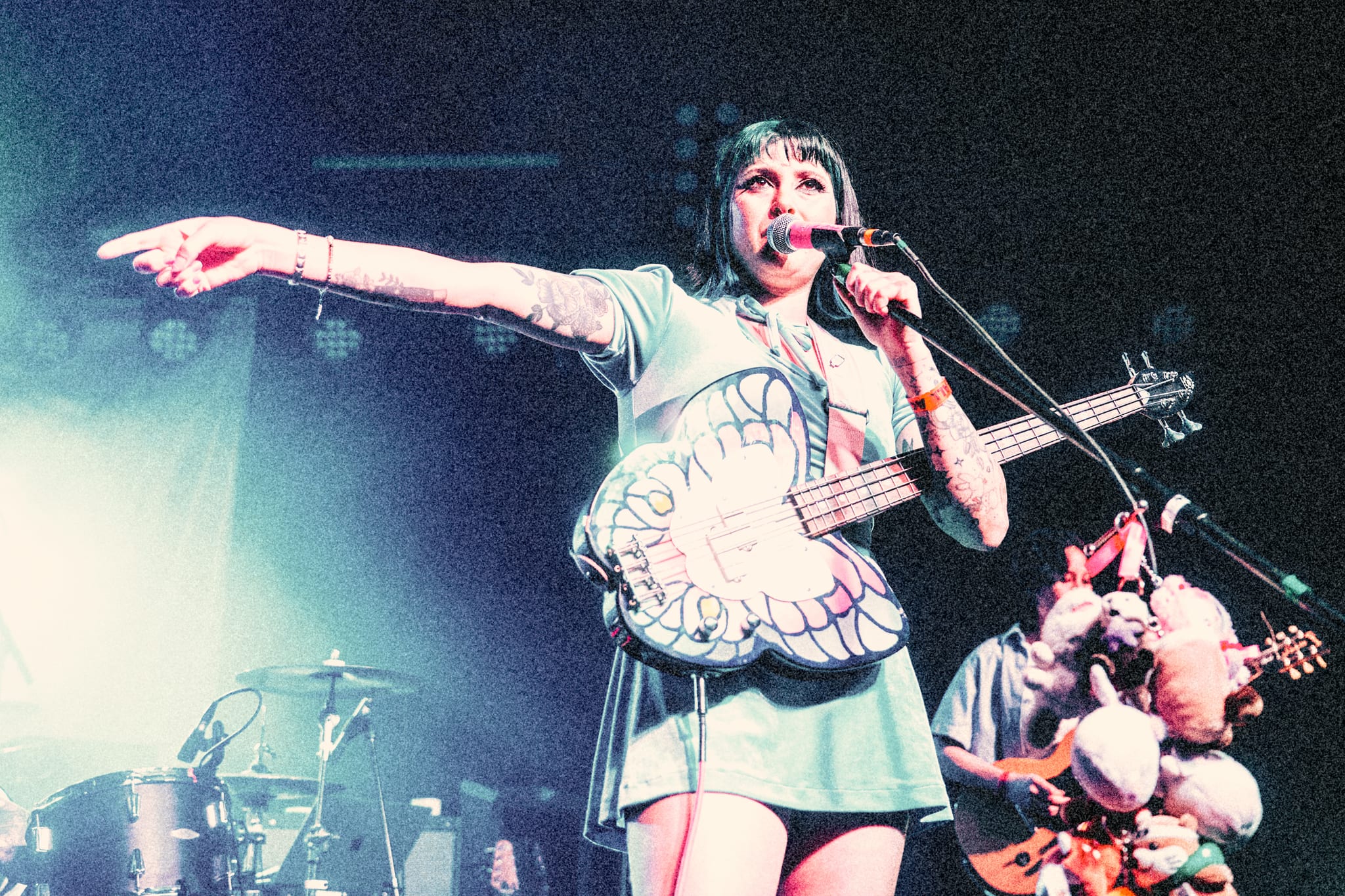 Pup delivering an energetic punk performance at The Glass House in Pomona with illuminati hotties and Suzie True