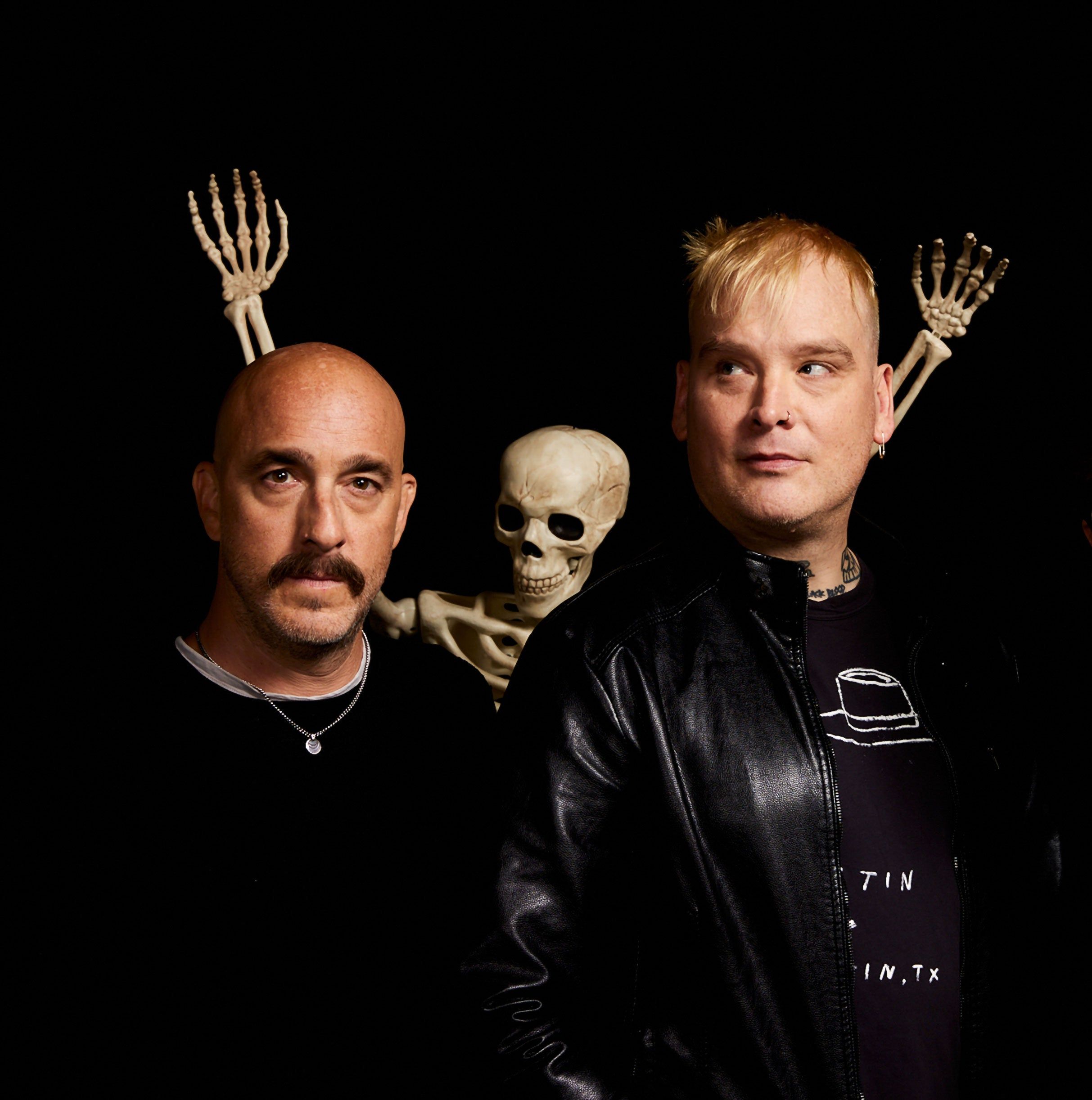 Alkaline Trio performing live on stage