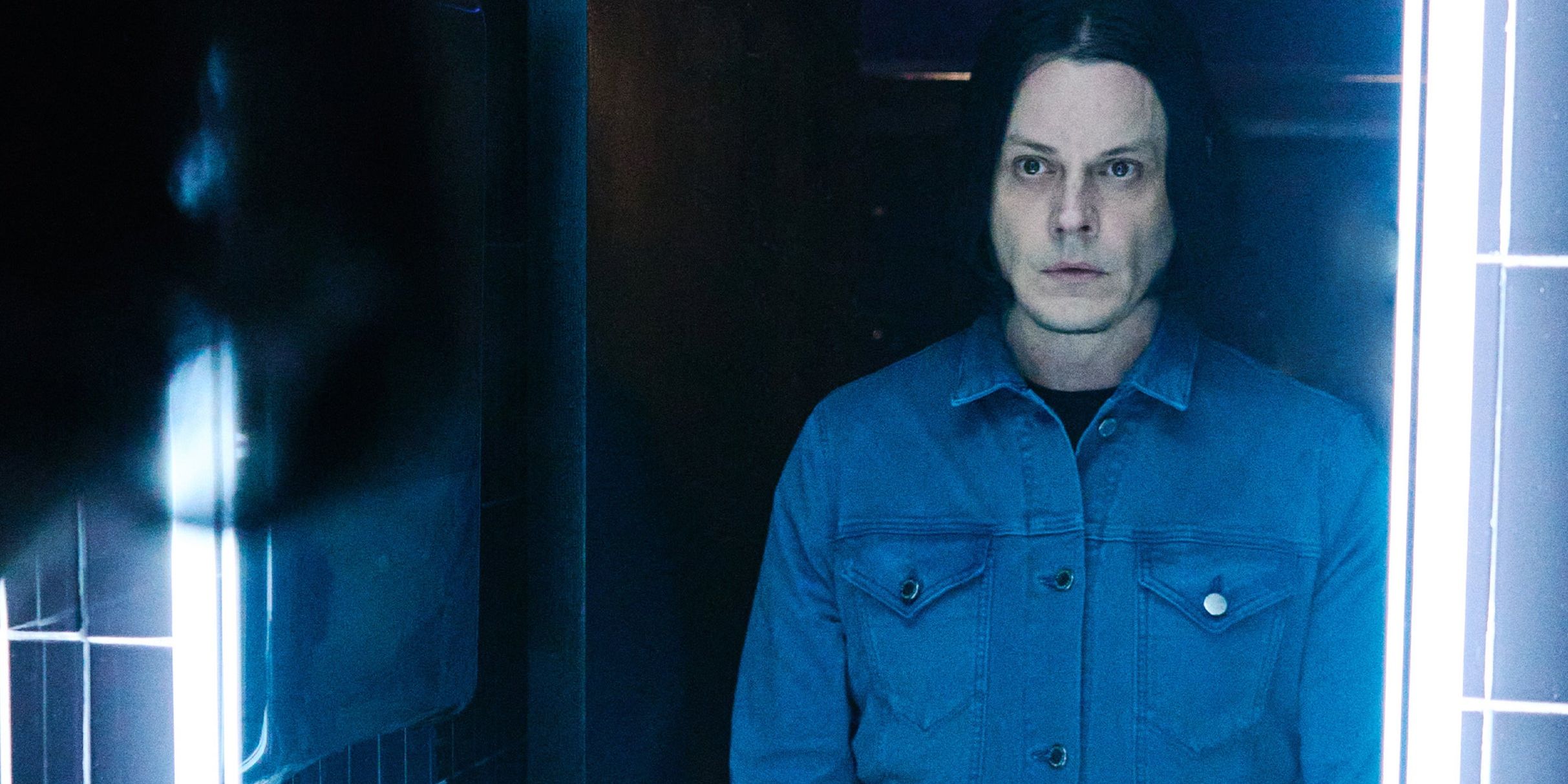 Jack White performing live on stage during a 2026 tour announcement
