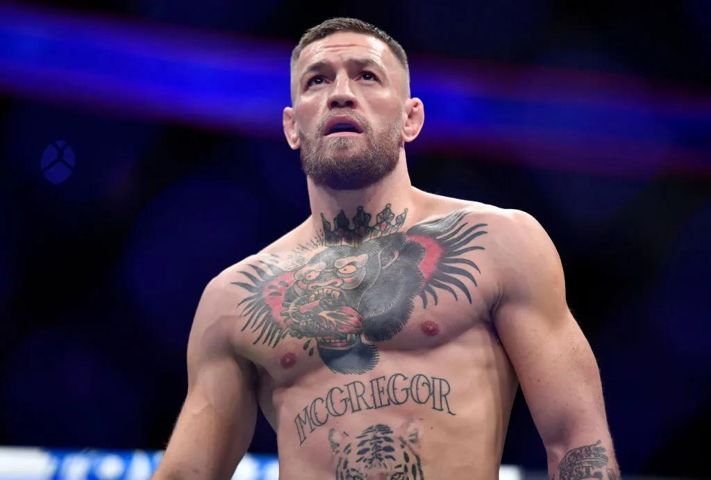 Conor McGregor preparing to fight inside the octagon at a UFC event