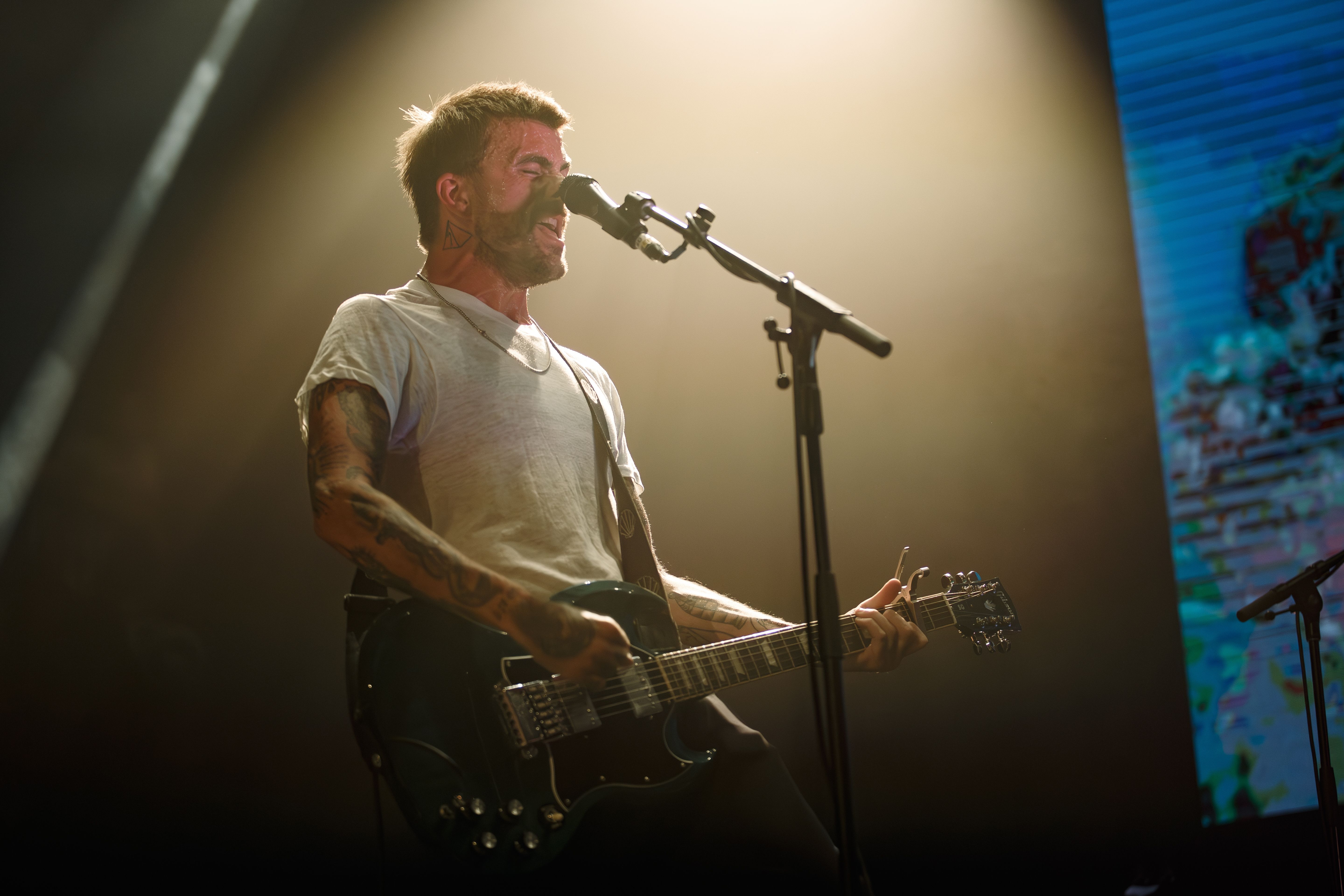 Anthony Green performing live on stage during a solo set