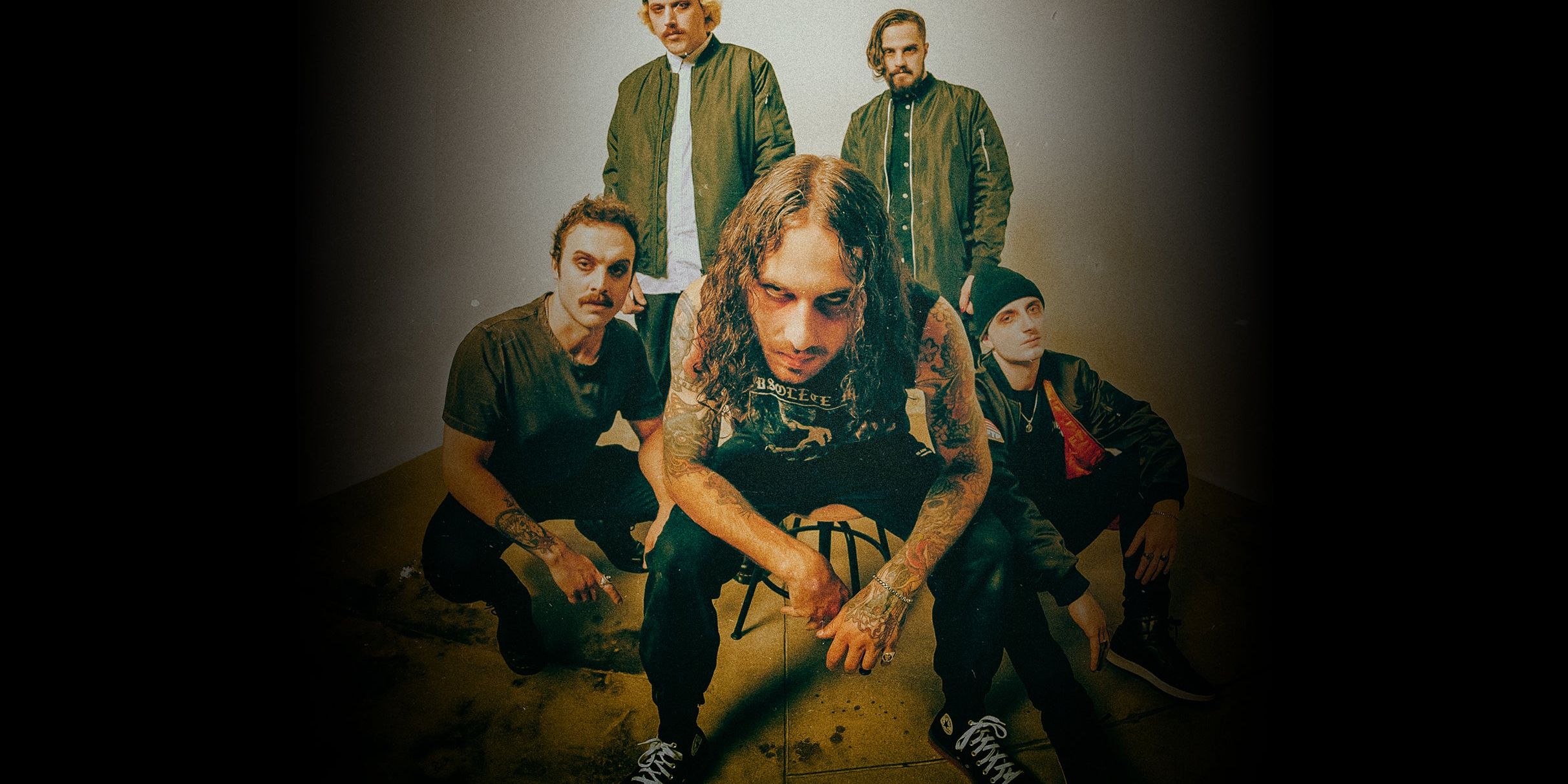 Spite performing live on stage during a headlining tour