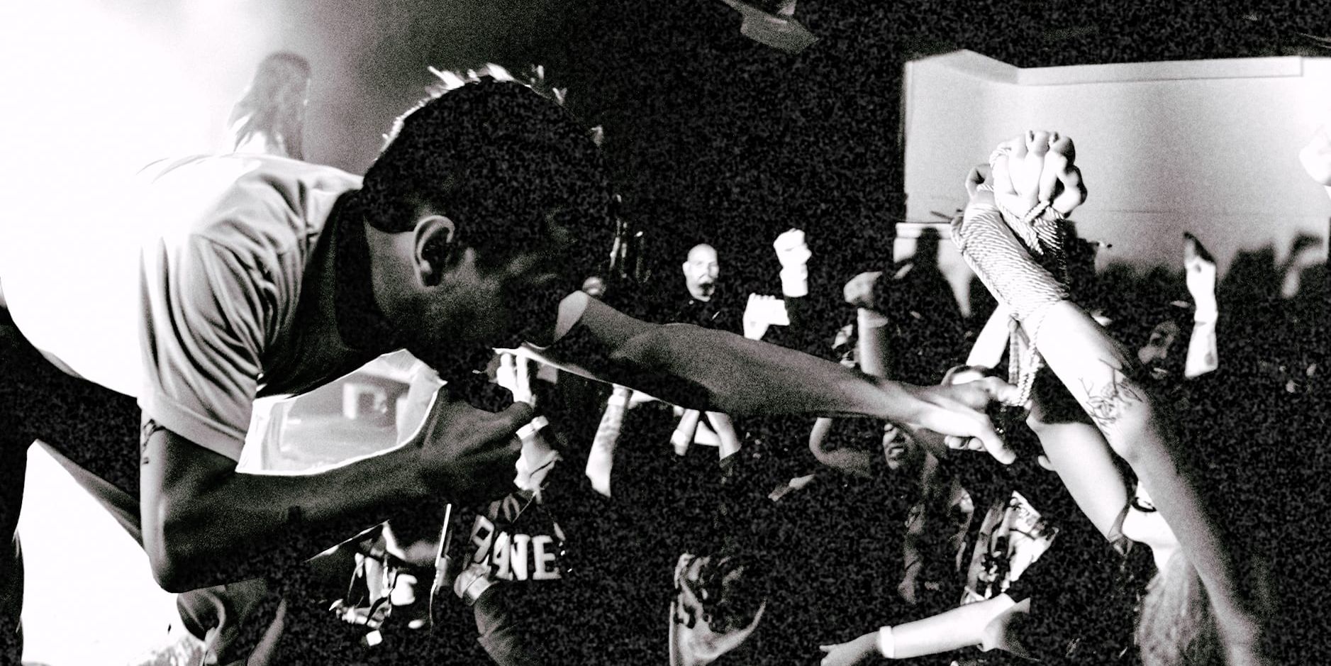 La Dispute frontman Jordan Dreyer reaching into the crowd at The Glasshouse, Pomona, April 27, 2026. Photo by Joma Mandocdoc.