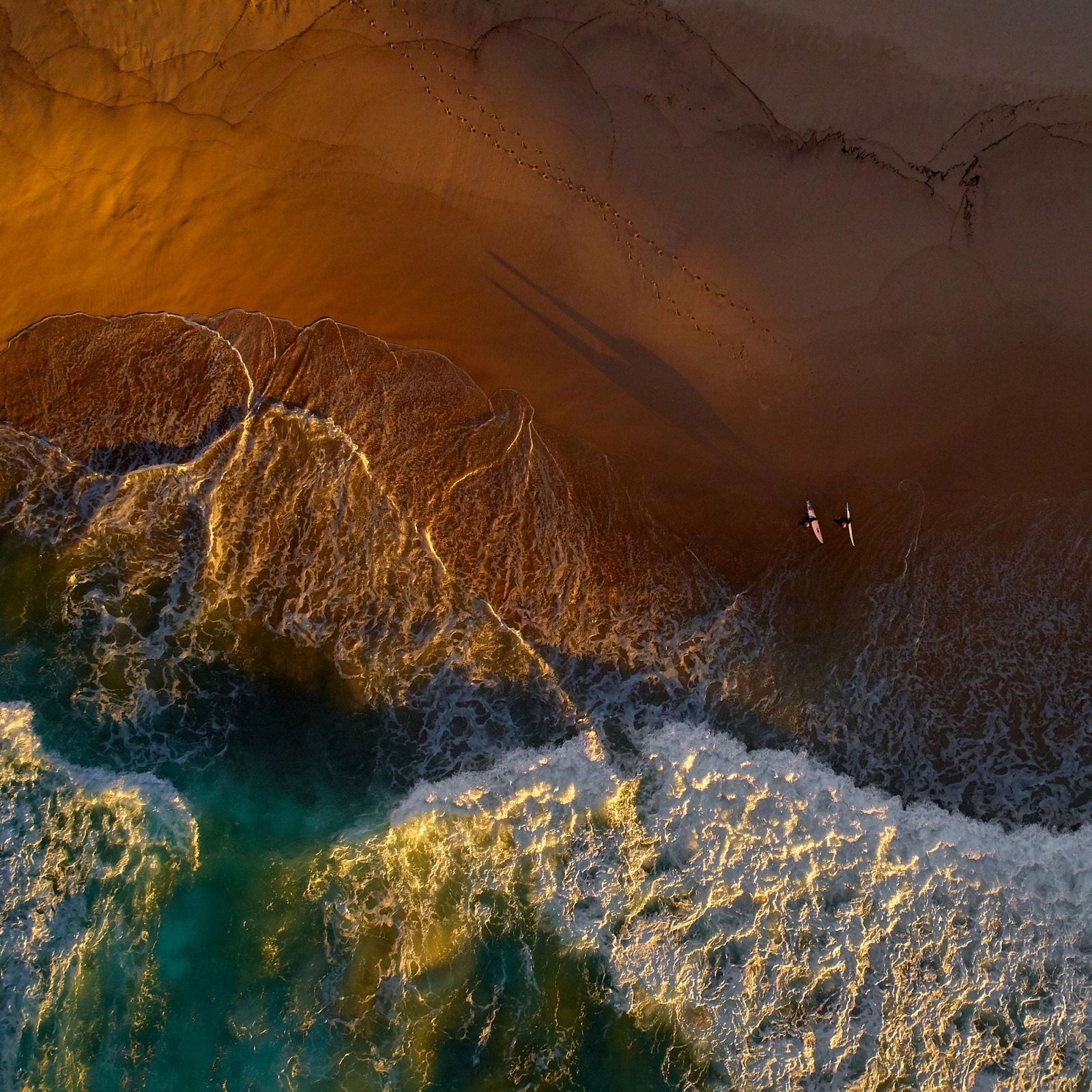 Aerial Surfer Shadows