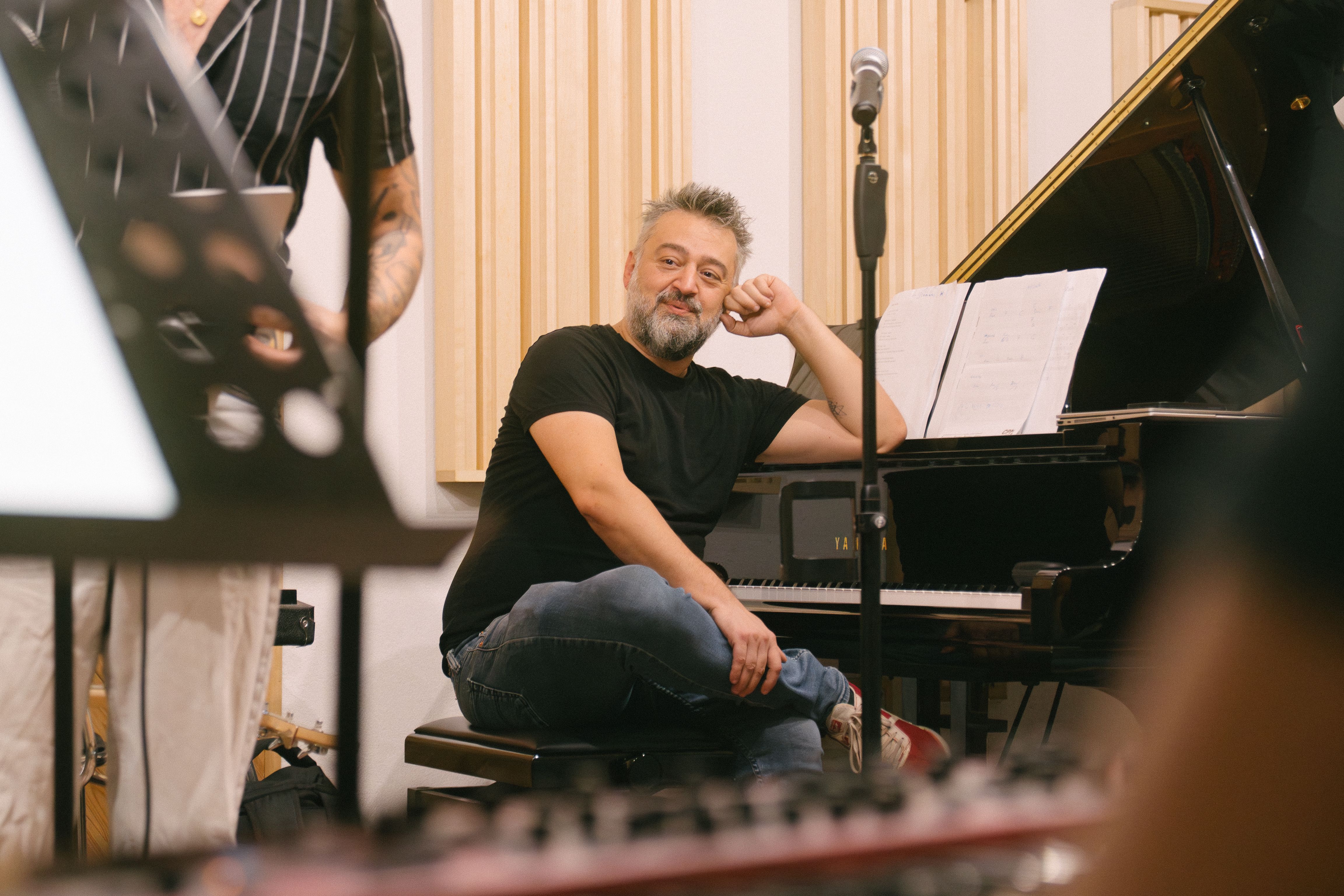 Vocal Coach at a piano