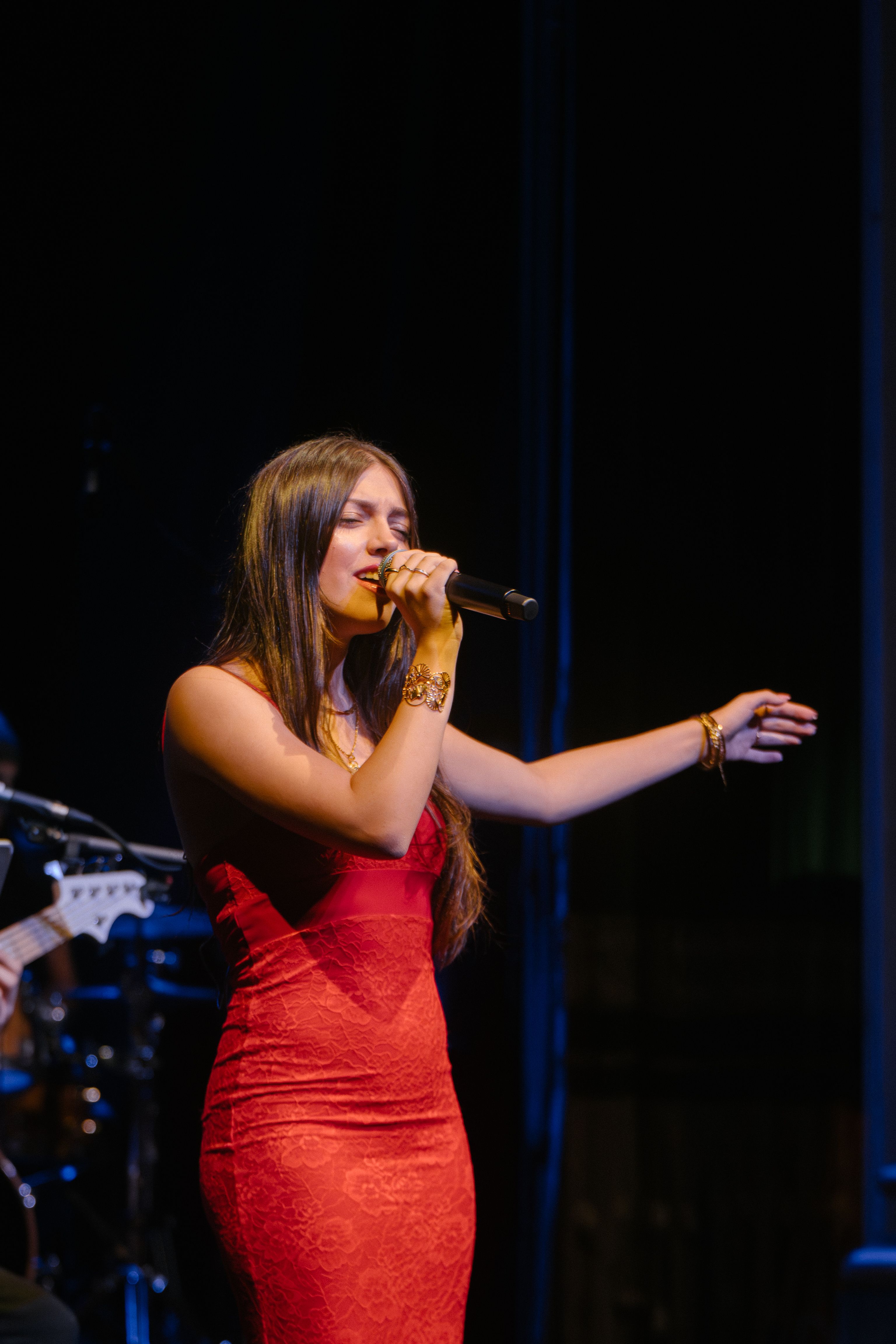 singer in red dress