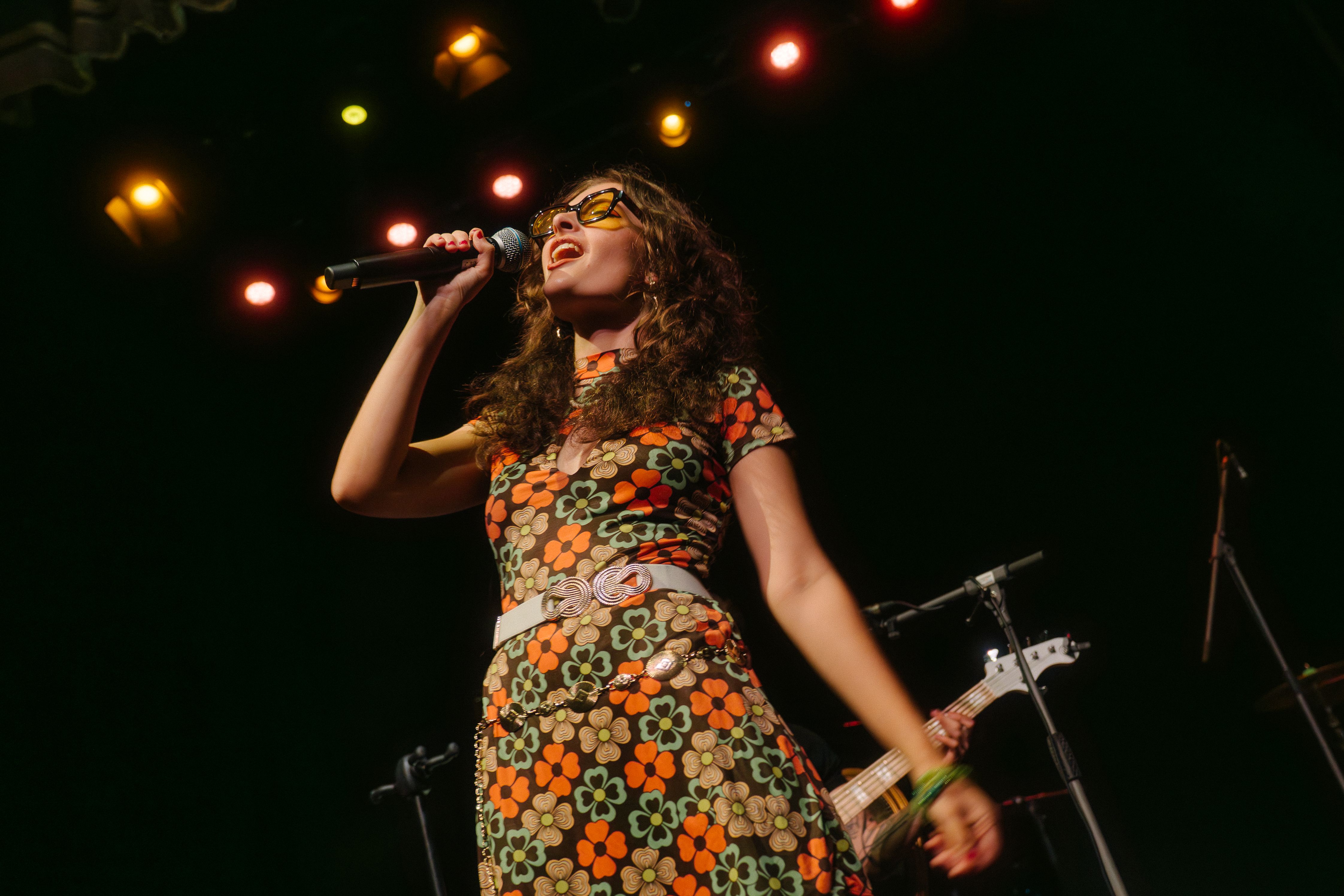 singer in colourful dress