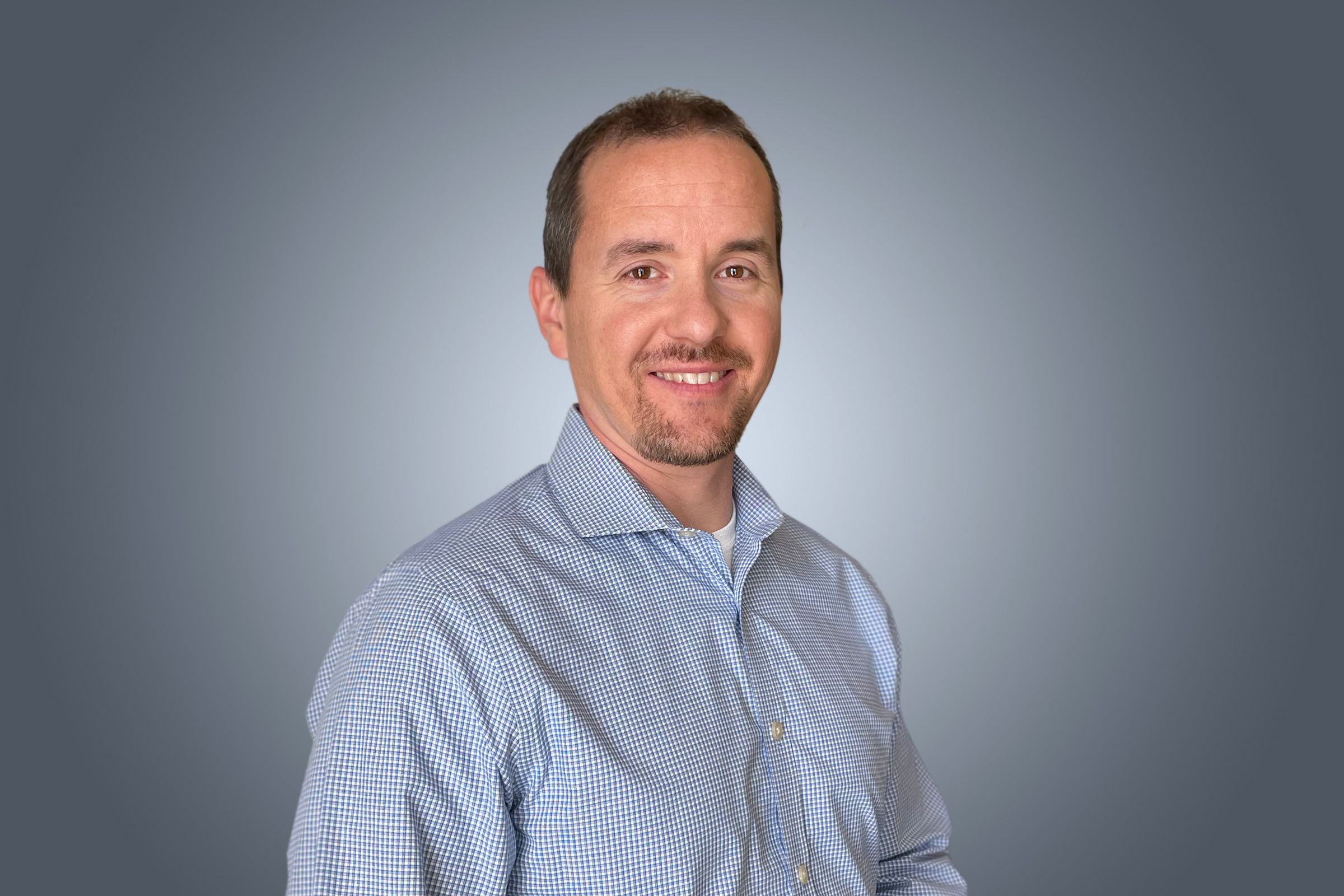 Tim Champagne headshot