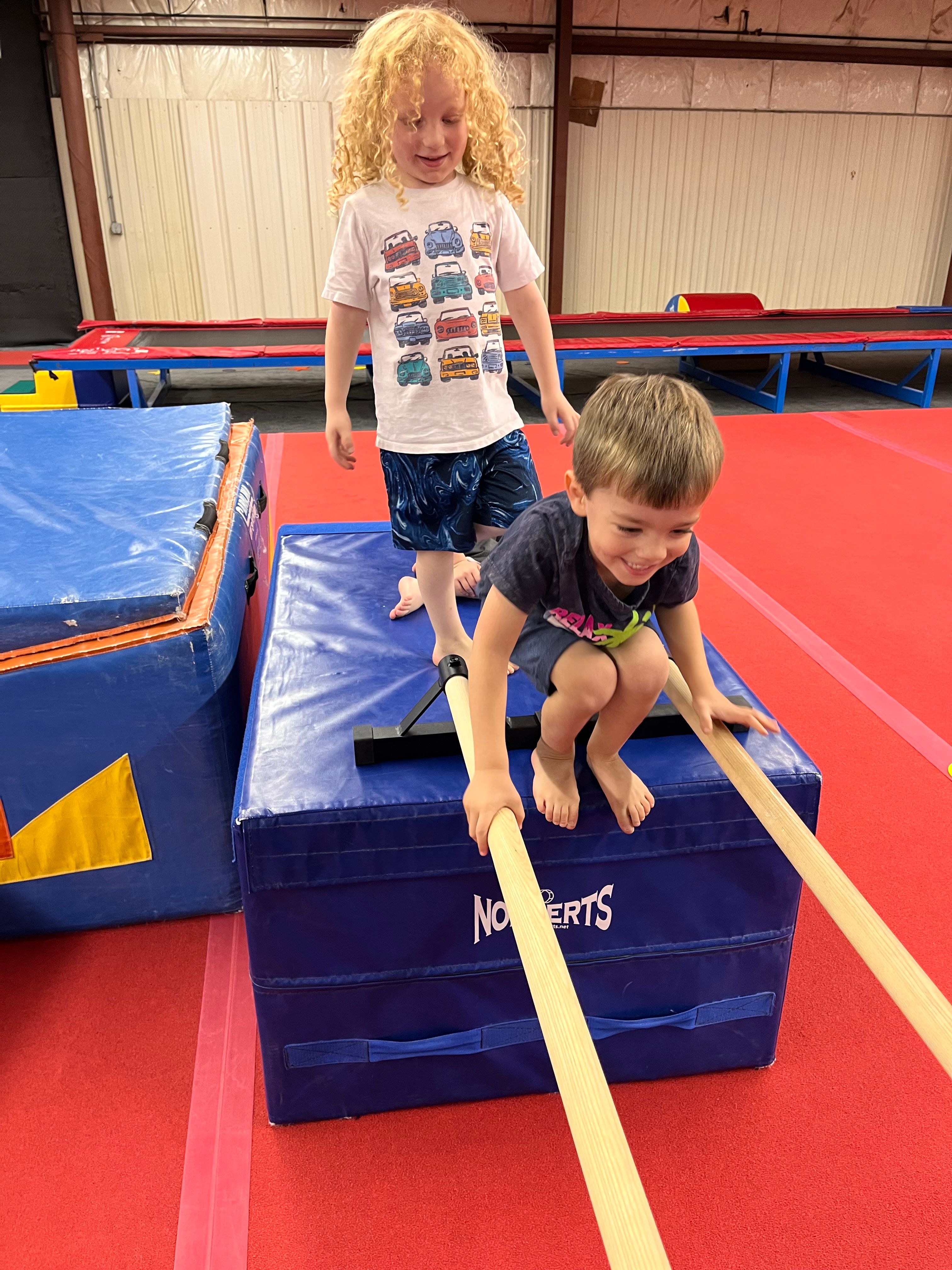 Kids playing on obstacle course