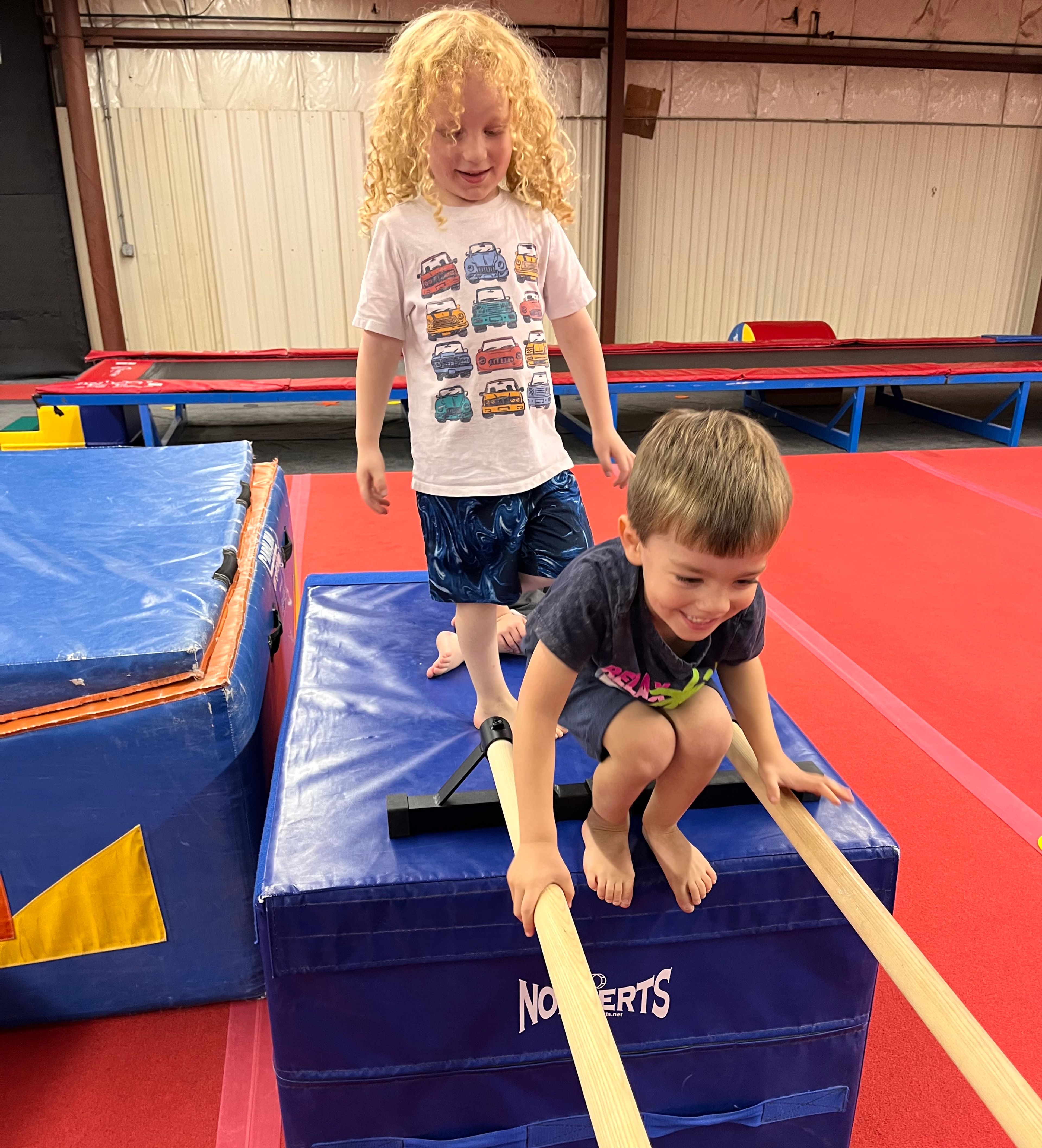 Kids playing on obstacle course