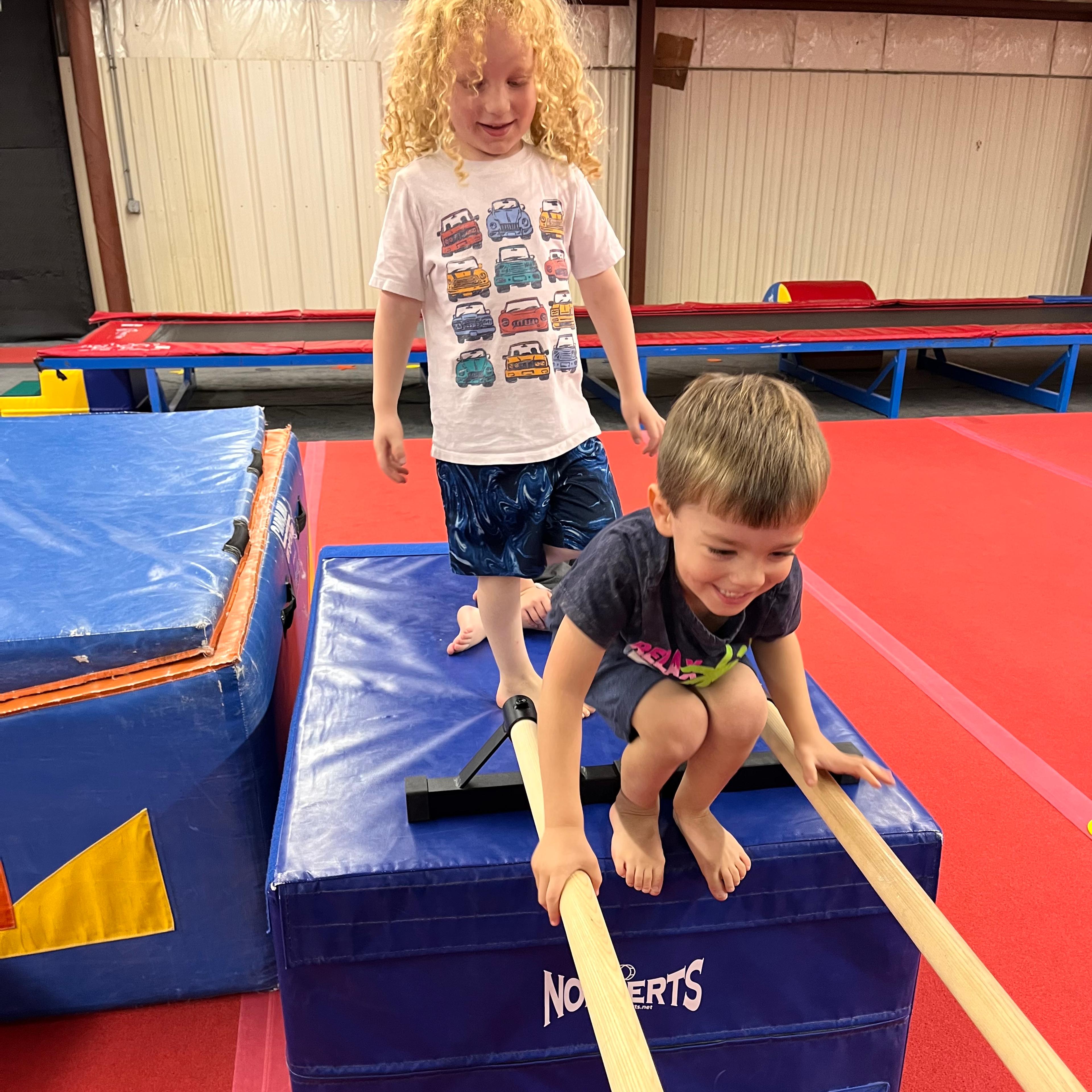 Kids playing on obstacle course