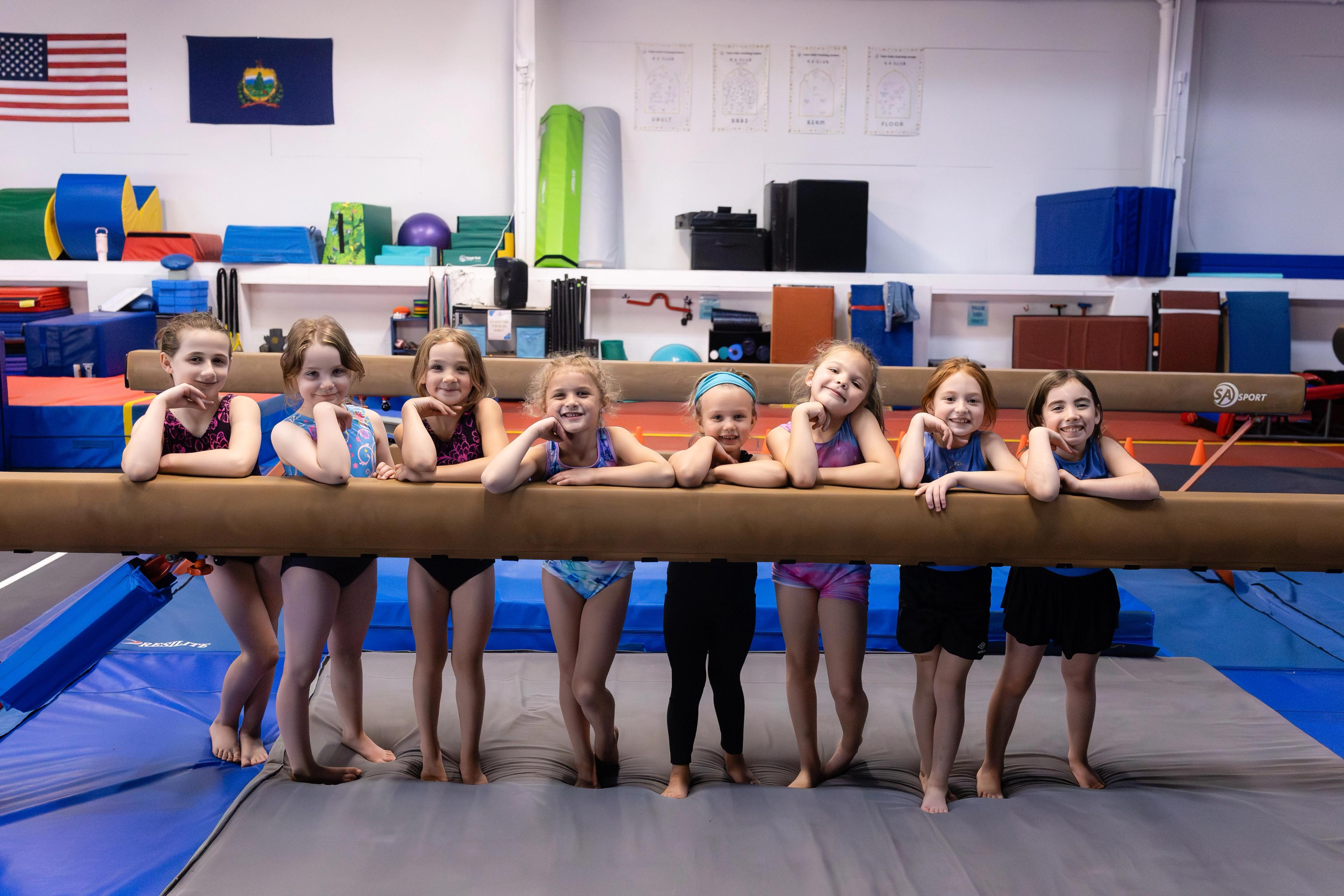 A dozen kids gathered together during summer camp.