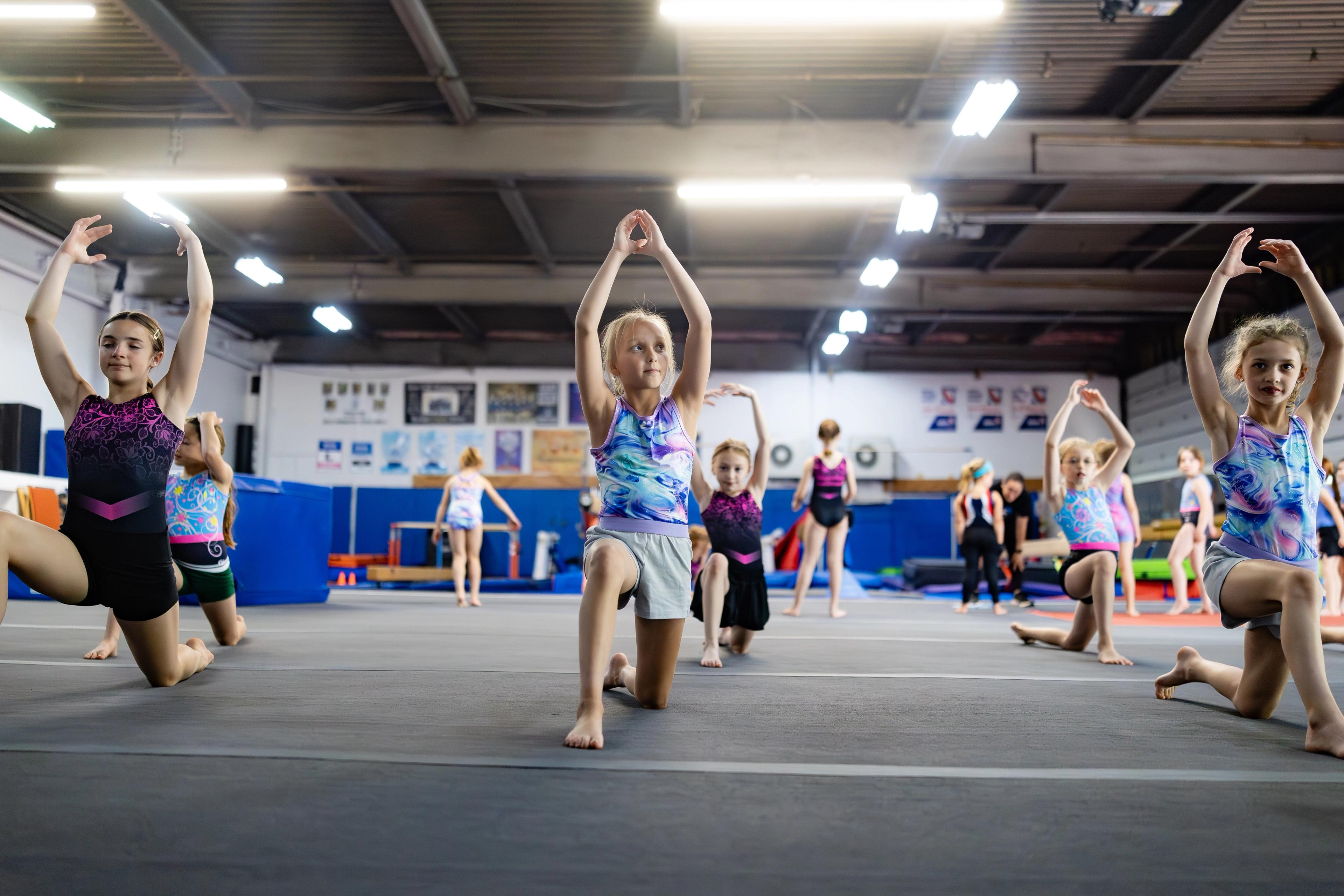 gymnast's hands on a bar
