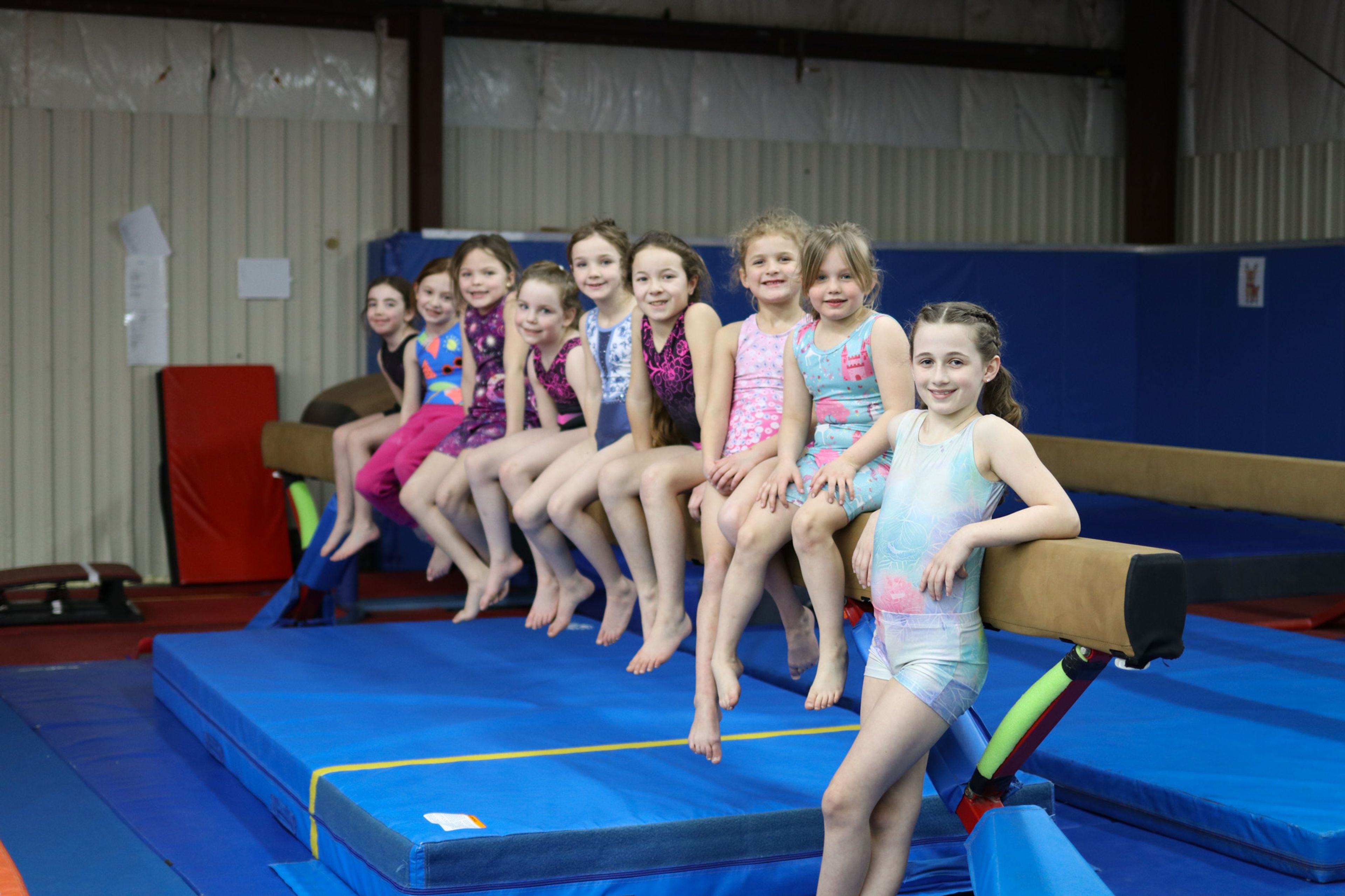 A dozen kids gathered together during summer camp.