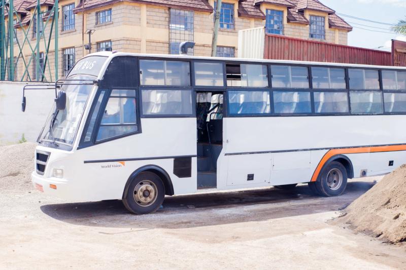An image of a white finished bus