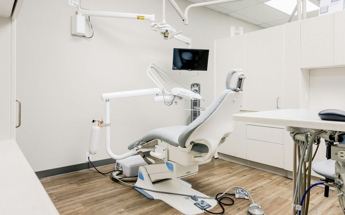 Aerial view of a dental practice exterior, clinical and architectural.