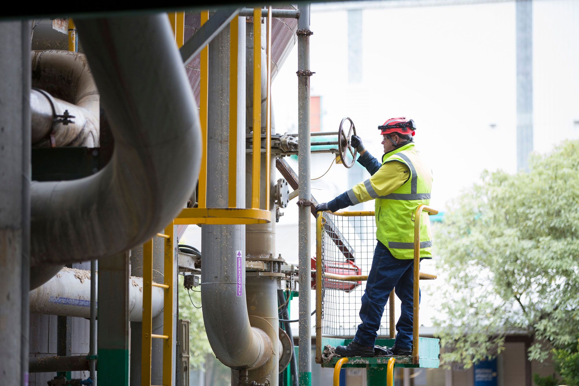OjiFS people working with machinery