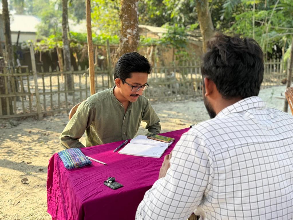 farmer being advised by man 