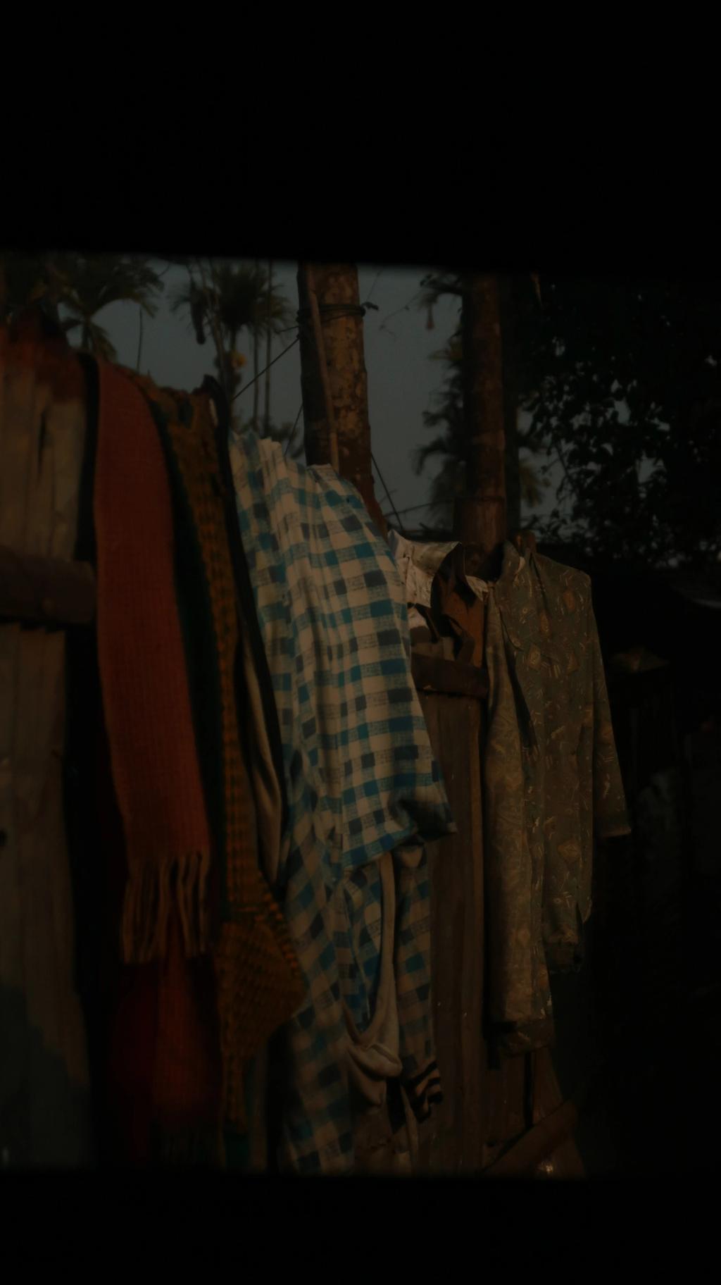 cloths hanging on fence