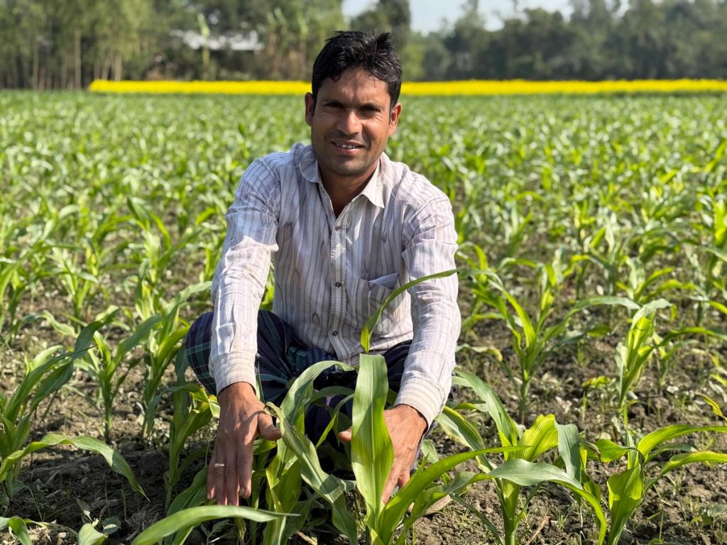 man in the field with crop