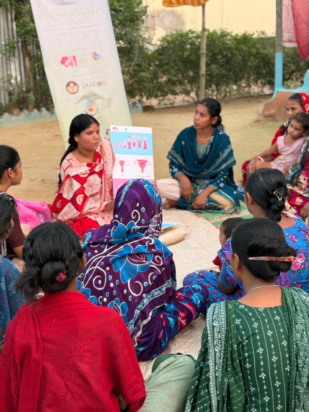 women talking around in a circle