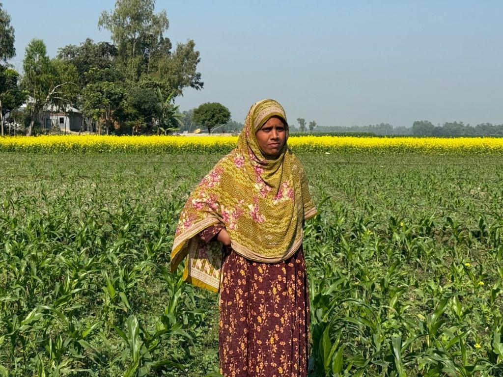 woman in the field with her crop