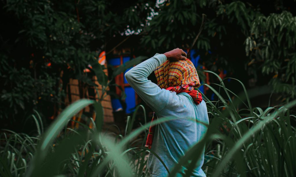 man holding his head 
