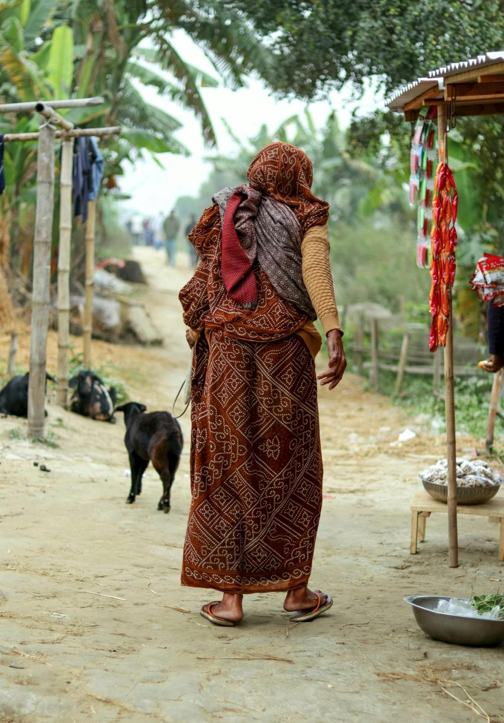 woman walking in village
