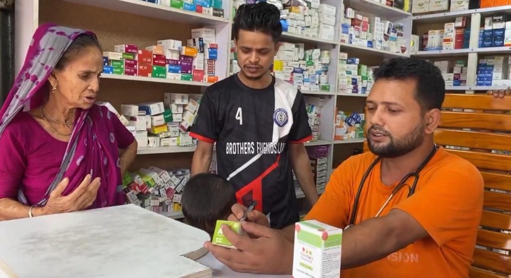 pharmacist prescribing medicine to patient