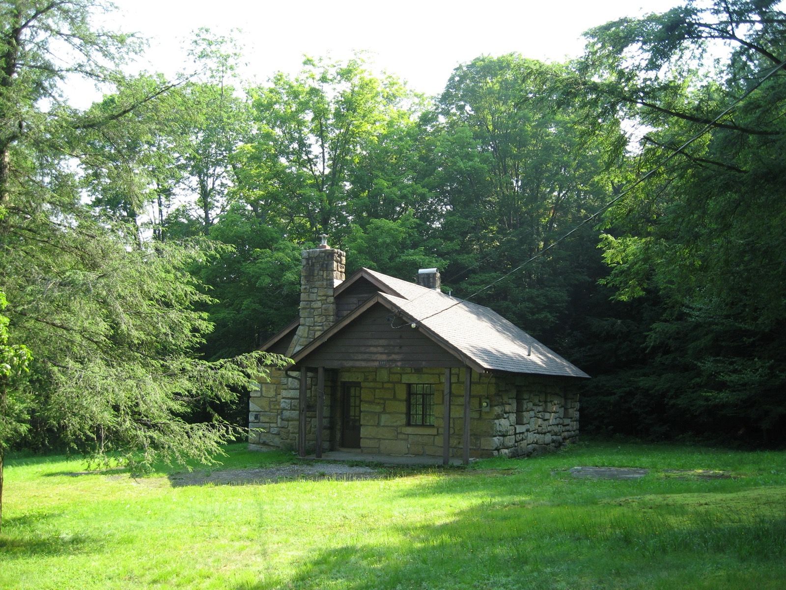 Stone cabin among trees