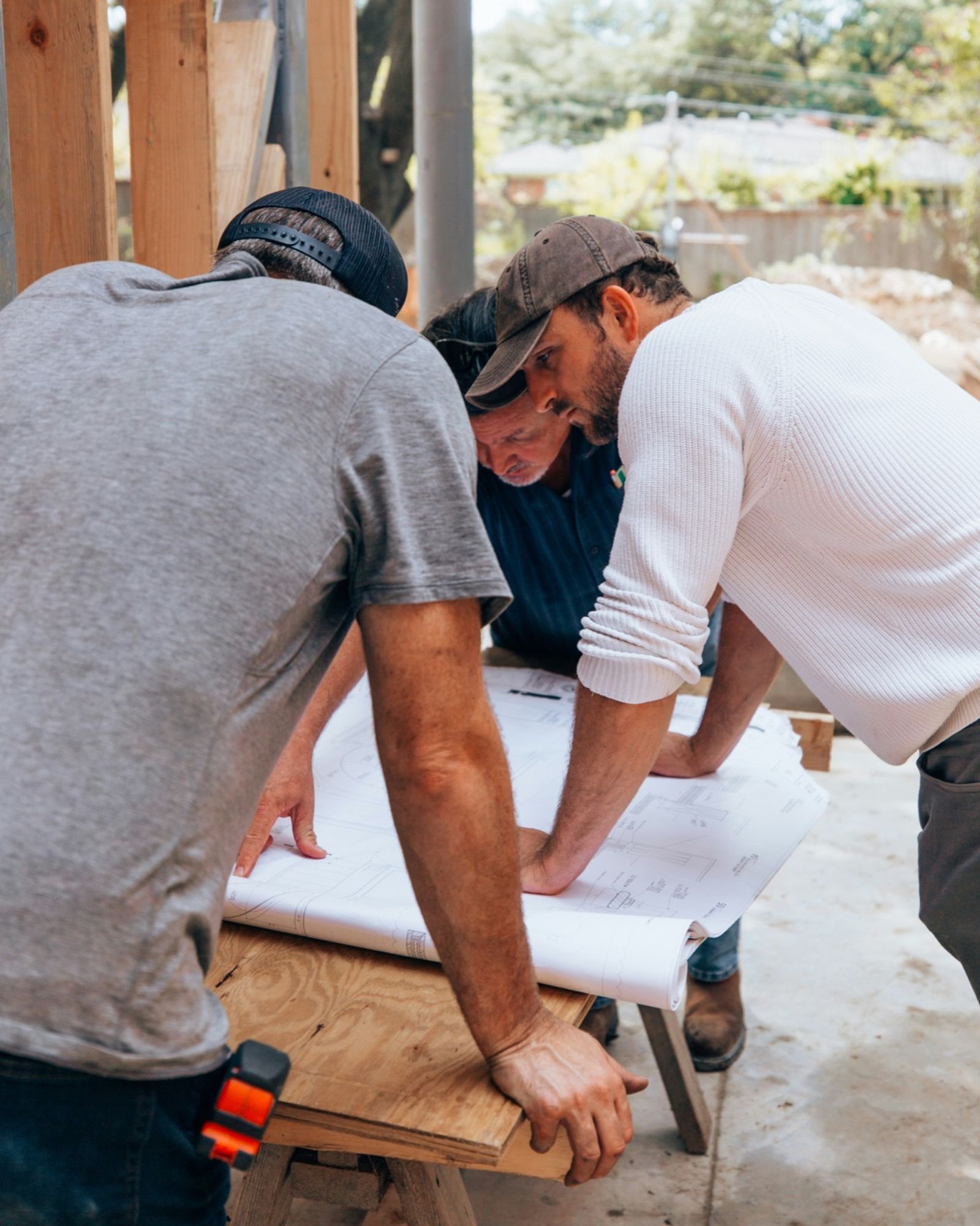 Builders reviewing plans
