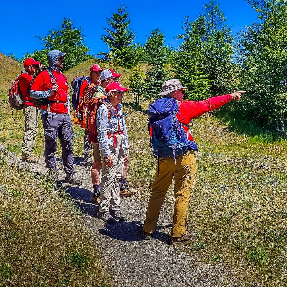 Volunteers practice field interpretation on trail.