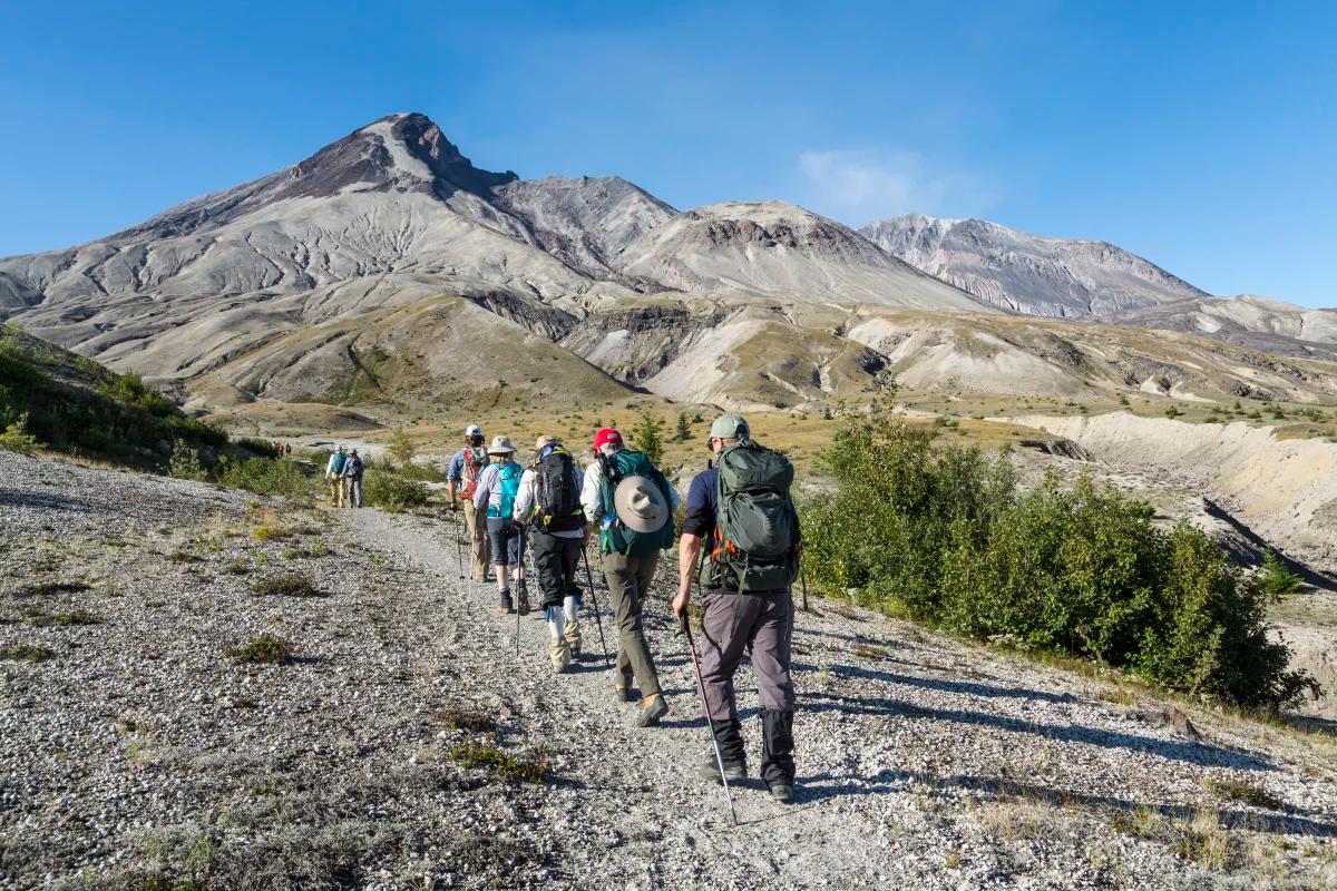 Hikers walking toward the crater of Mount St. Helens