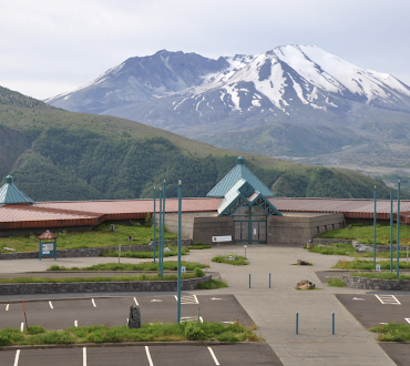 Wide angle view of the Science and Learning Center with Mount St. Helens in the background.