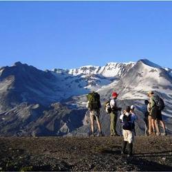 Group of people learning about Mount St. Helens firsthand, at the volcano!