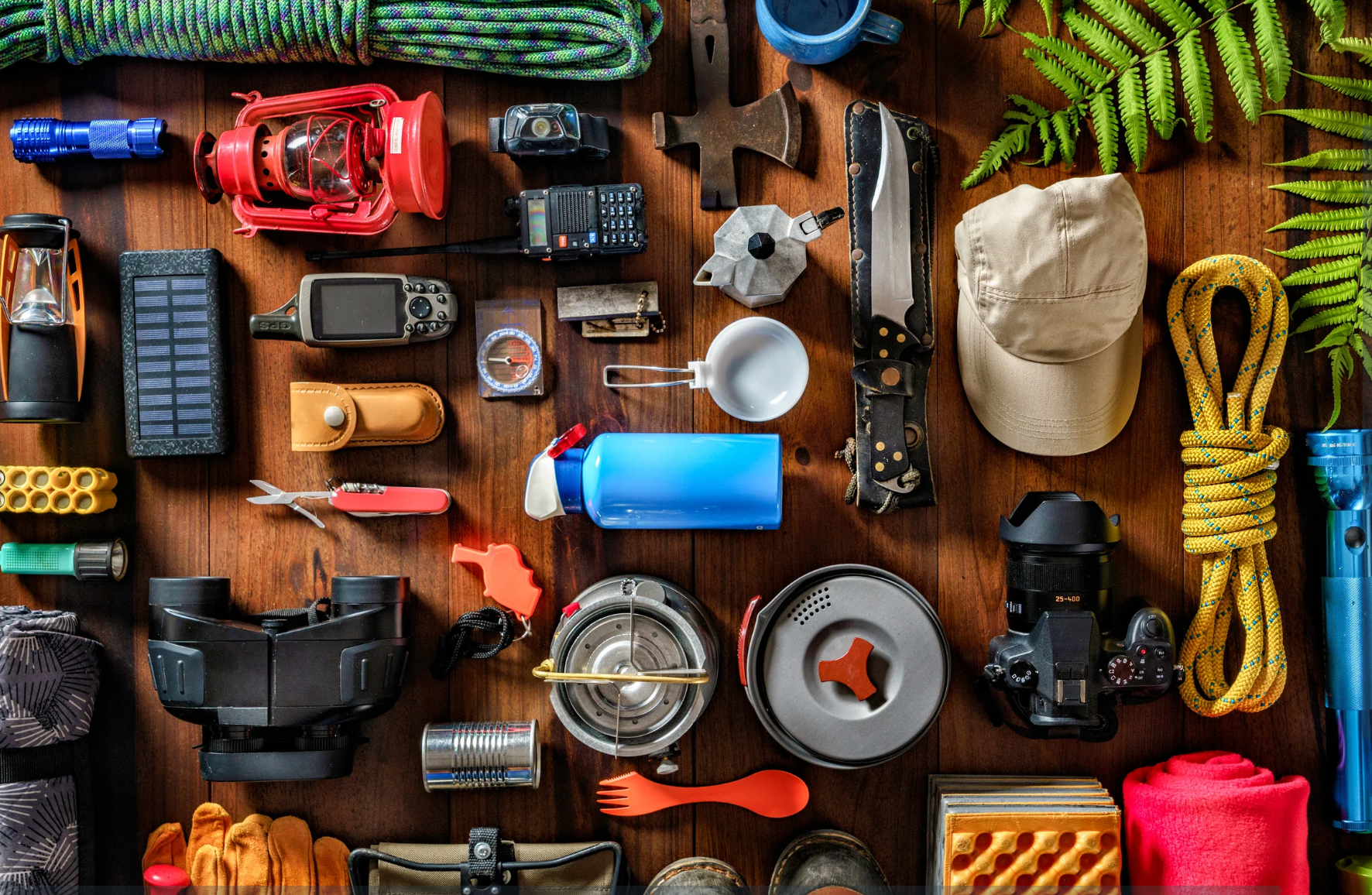 collection of hiking equipment on a table