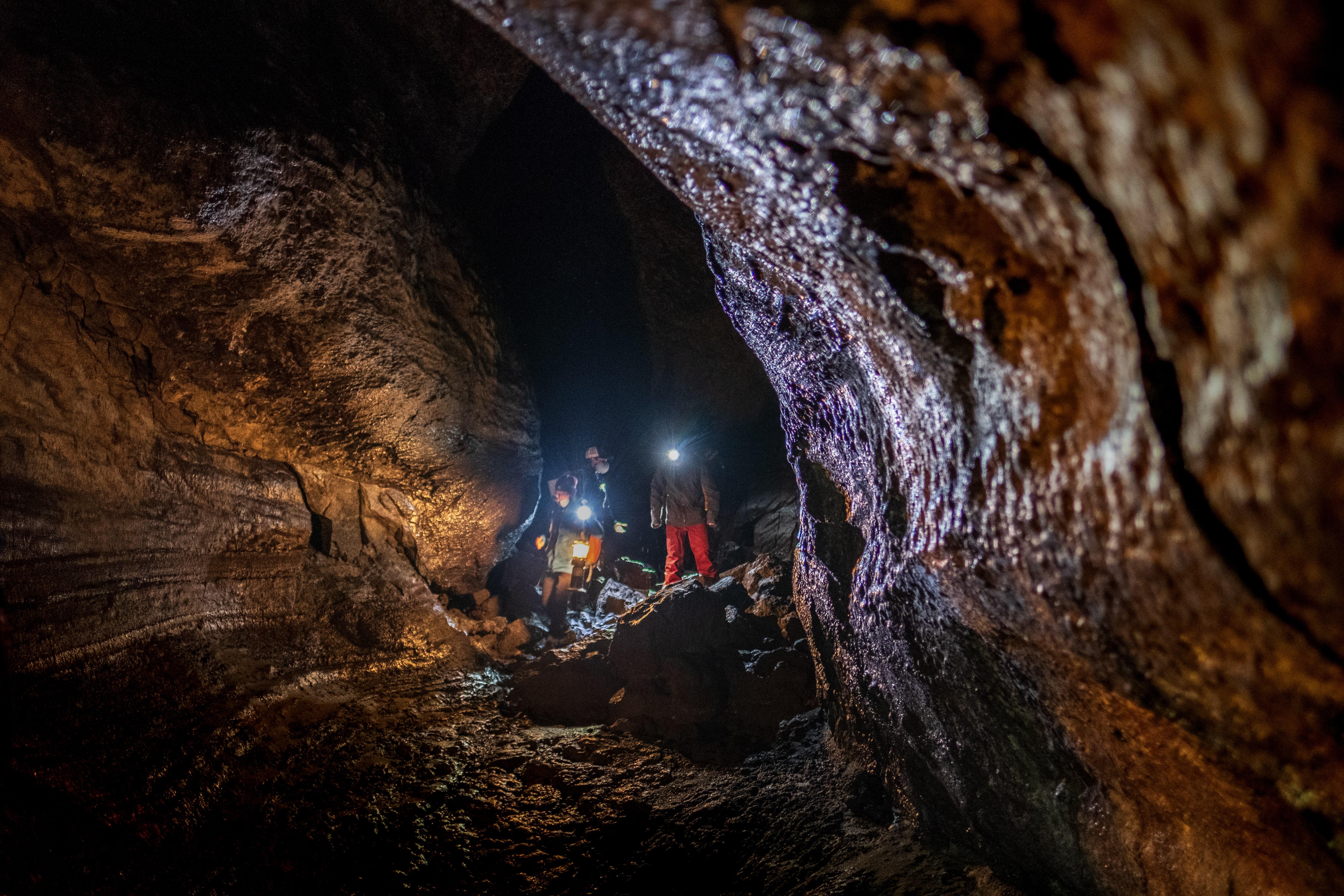 Hikers inside Ape Cave. Photo credit Elise Murphy
