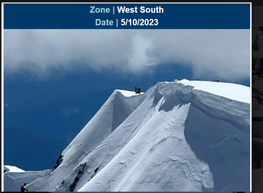 Mount St. Helens climbers standing on cornice overhang