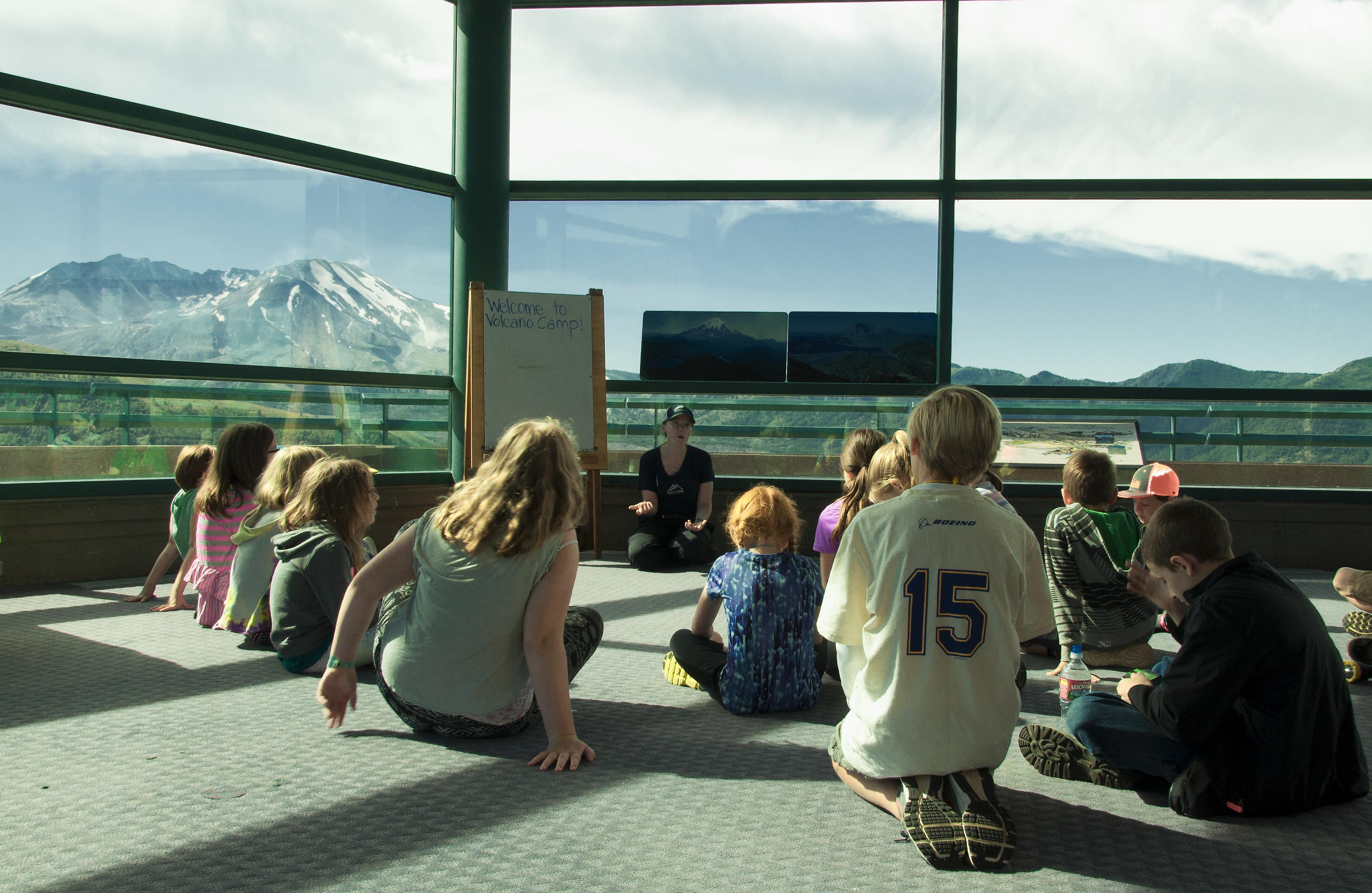Children learning in the shadow on Mount St. Helens
