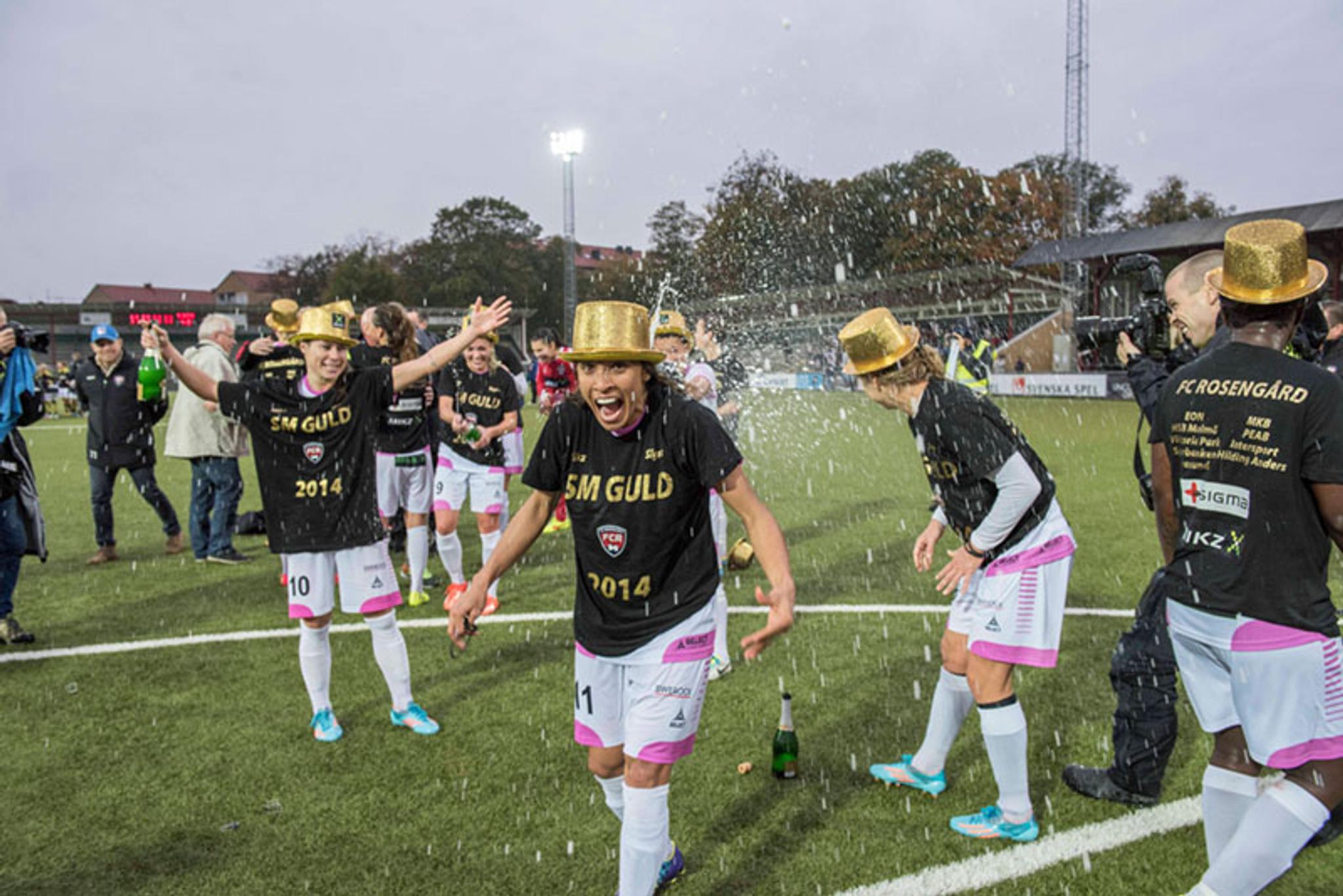 Marta and Ramona Bachmann (among others) celebrate Swedish Championship 2014 - the first time with the name FC Rosengård and ninth all time.