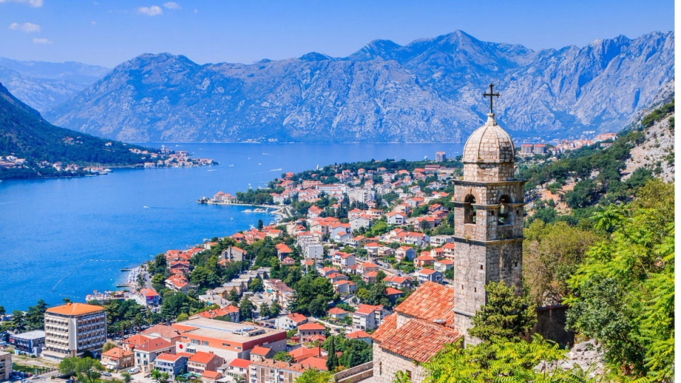 Beautiful view of Kotor and the Montenegro coastline and stunning church on the hill, to show the natural beauty of Montenegro as a country but also what secrets it has hidden throughout its mountaineous terrain. Gorgeous homes and villages are scattereed throughout and bring a unique experience to each traveler.