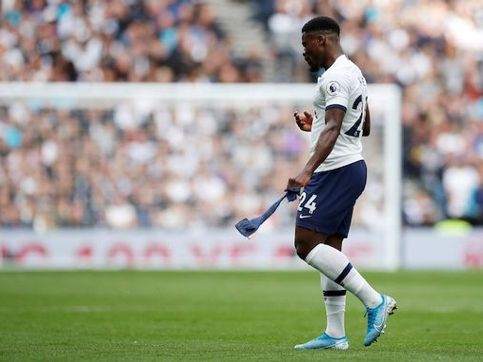 Professional footballer leaving the pitch with an apparent injury, illustrating the physical challenges and injury concerns discussed throughout this article.