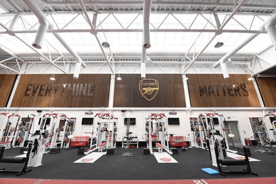 Arsenal FC's strength and conditioning gym, representing the modern investment in elite training facilities and performance systems explored throughout this article.