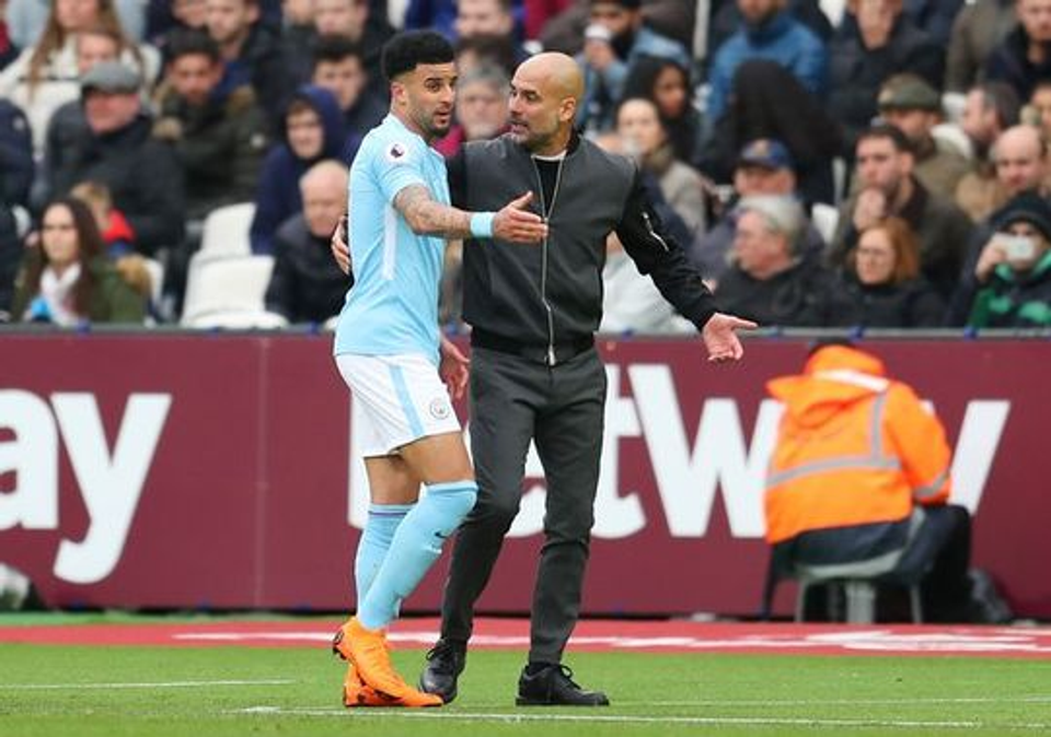 Manchester City manager Pep Guardiola giving instructions to a player during a match, representing the coaching environments surrounding world-class footballers.