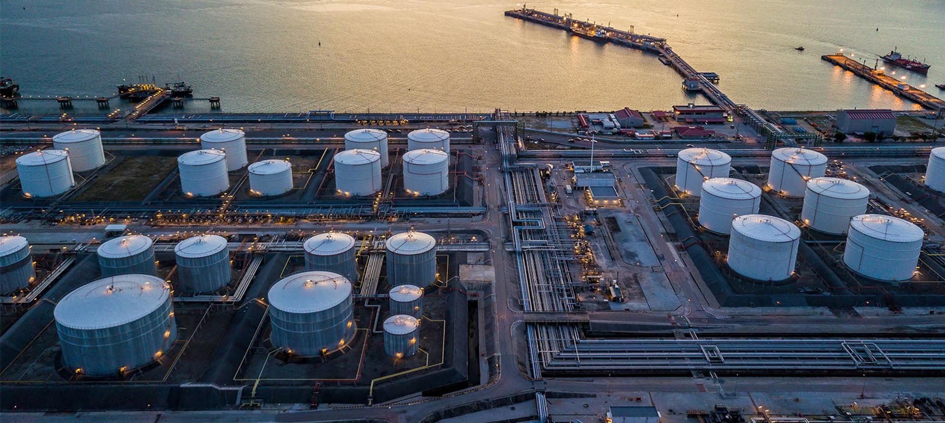 Aerial view of a storage-tank farm at dusk